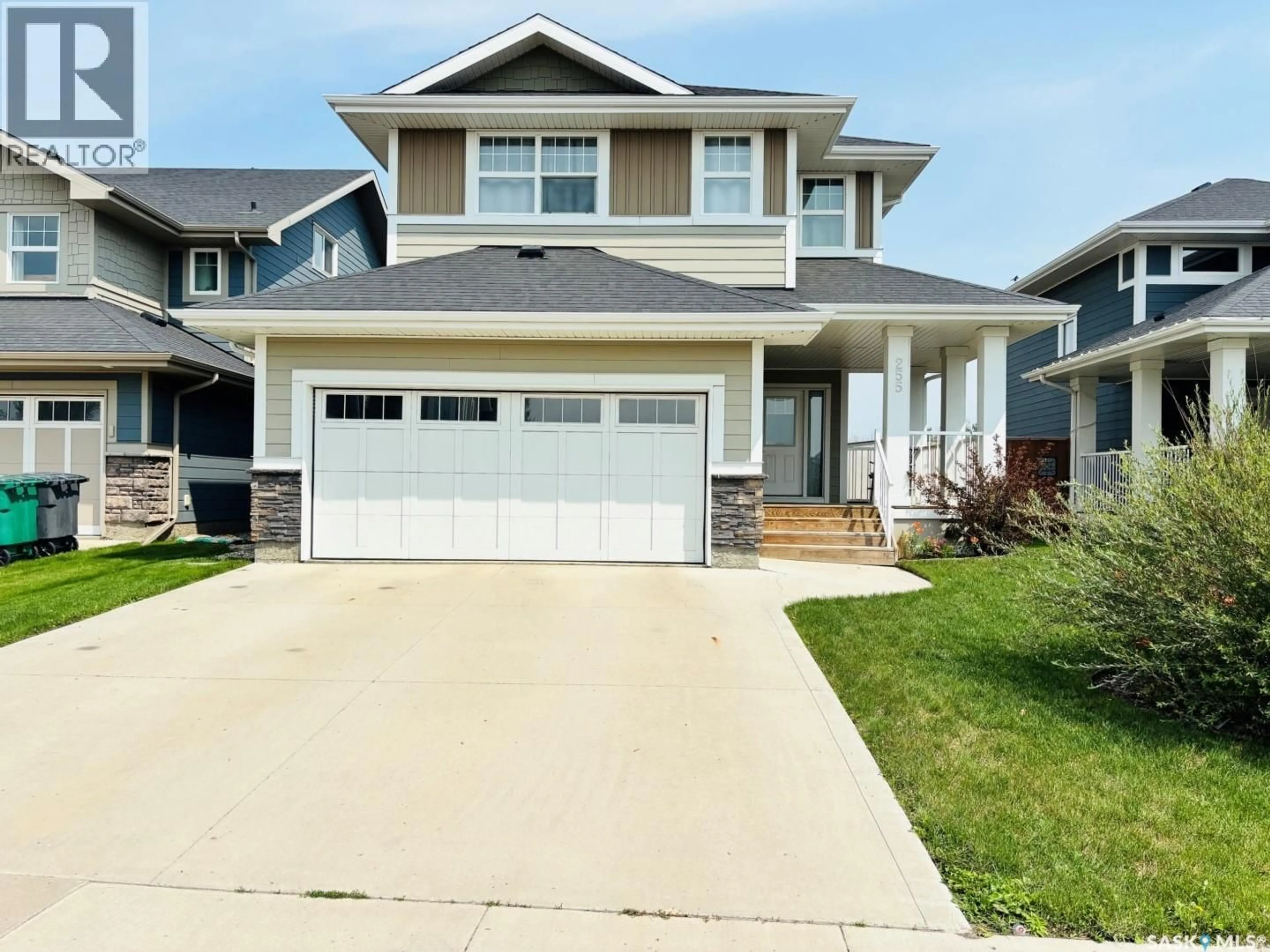 Home with vinyl exterior material, street for 255 EATON CRESCENT, Saskatoon Saskatchewan S7V0H4