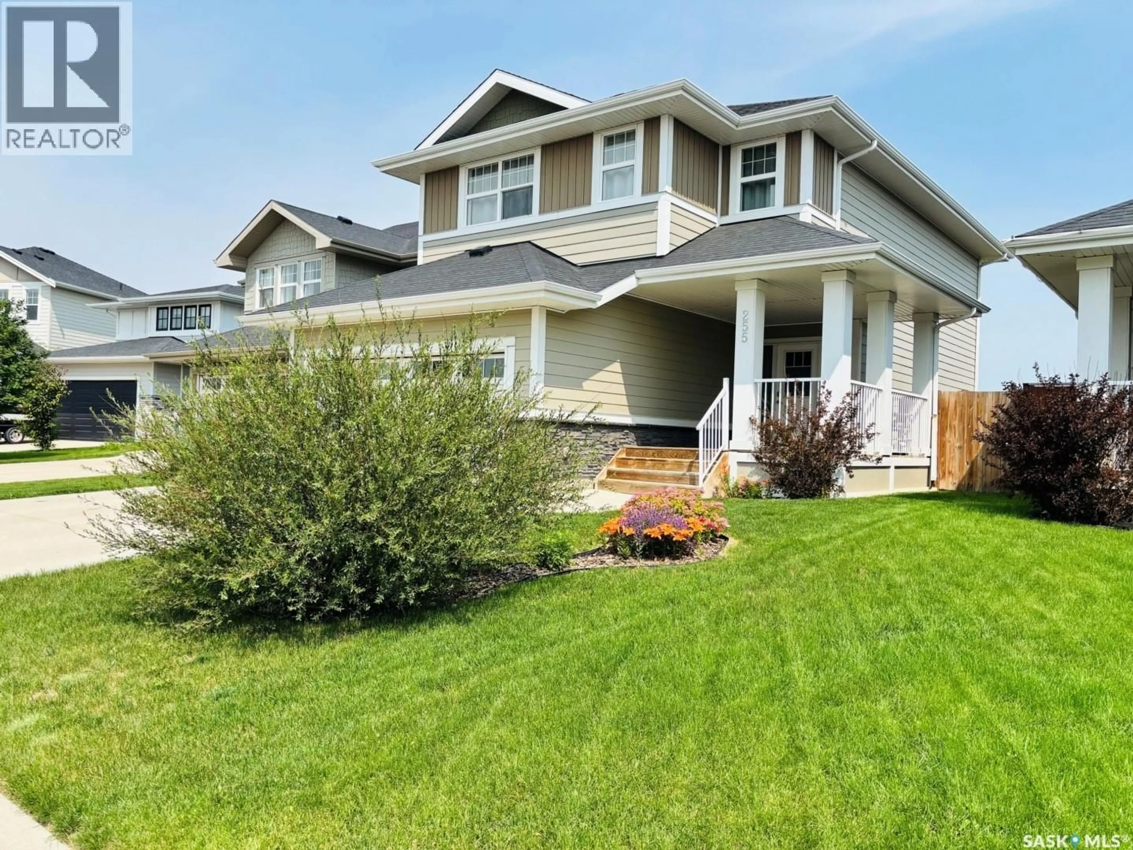 Home with vinyl exterior material, street for 255 EATON CRESCENT, Saskatoon Saskatchewan S7V0H4