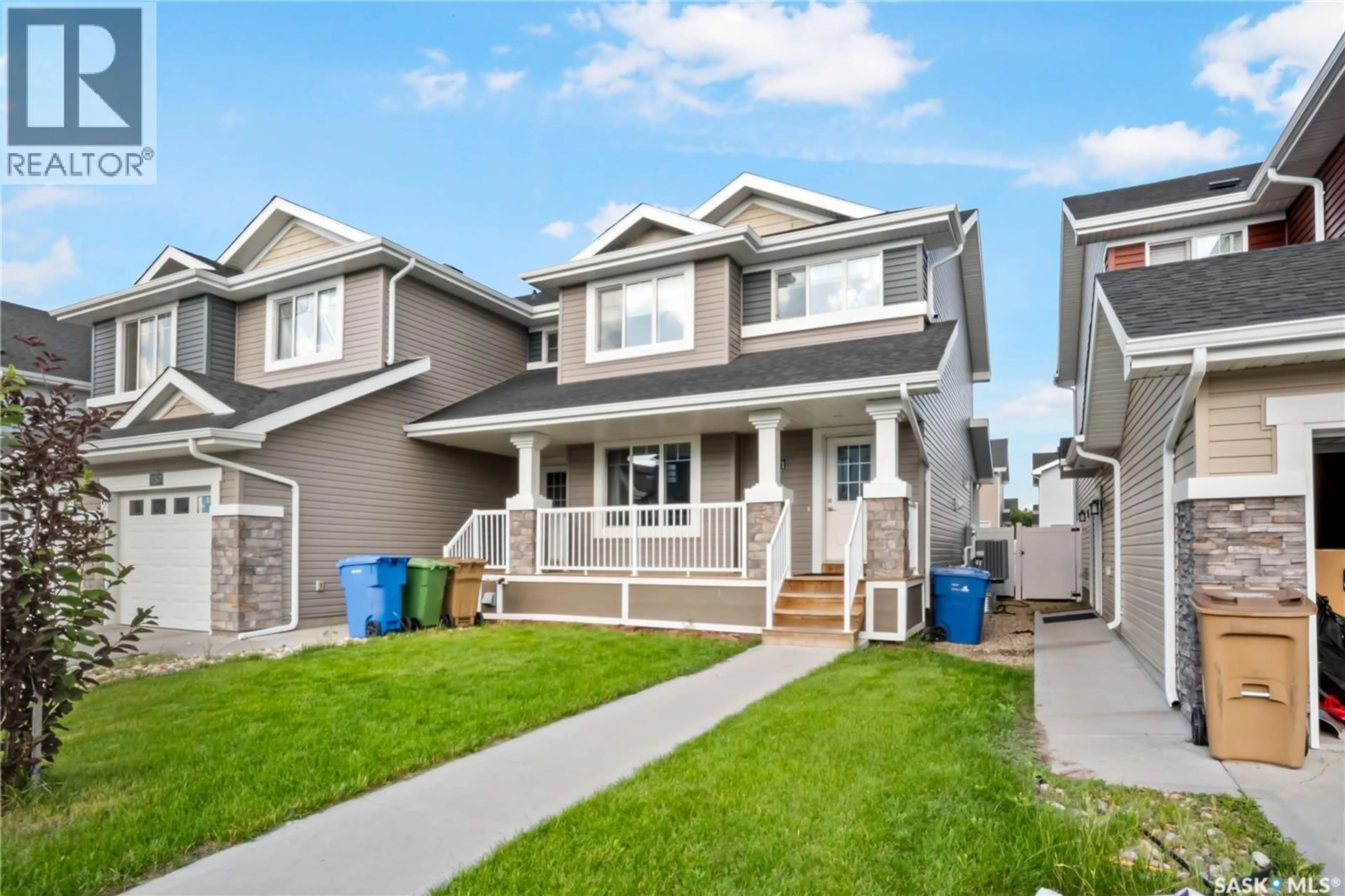 Home with vinyl exterior material, street for 3271 GREEN BROOK ROAD, Regina Saskatchewan S4V3R3