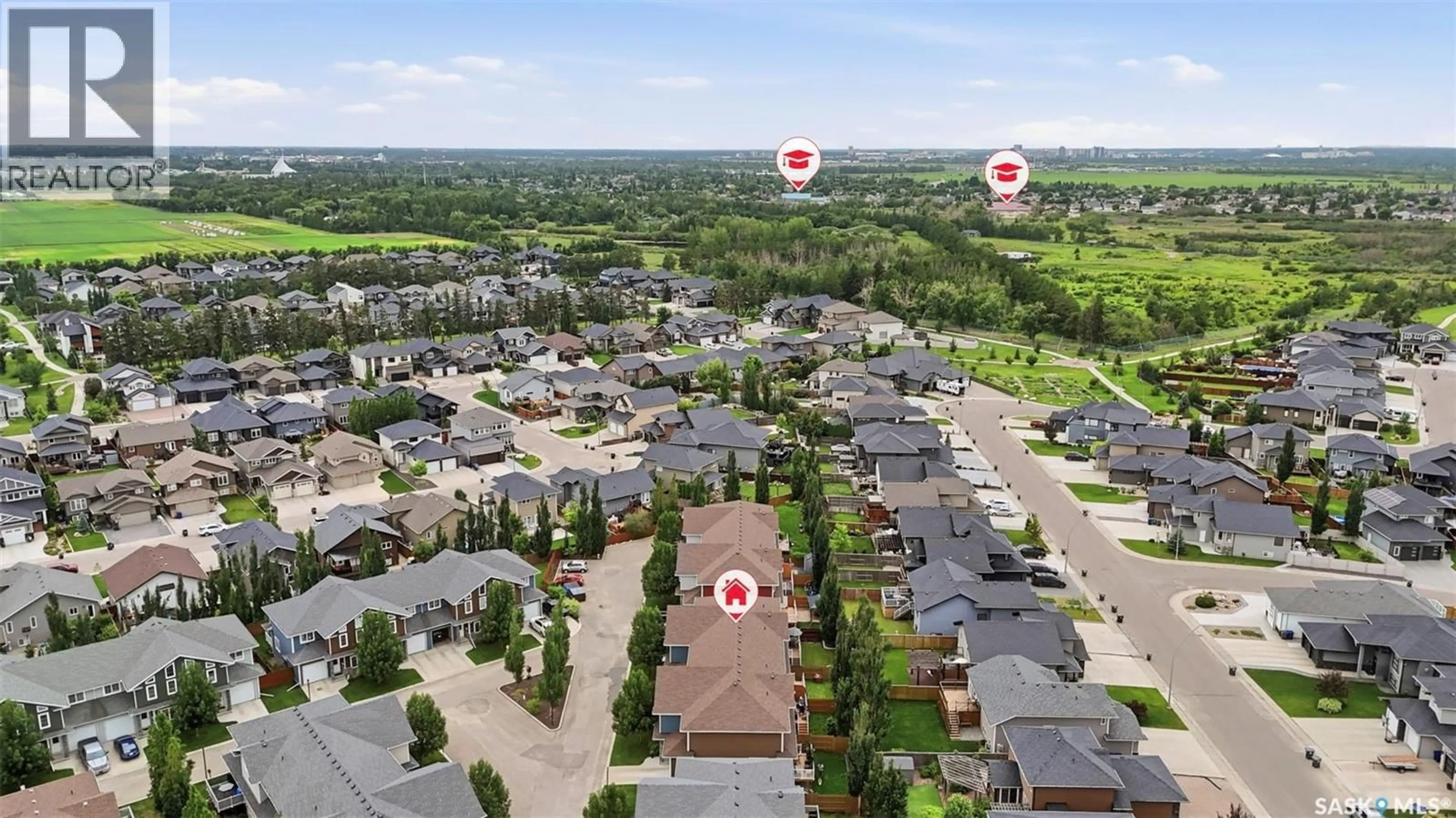 A pic from outside/outdoor area/front of a property/back of a property/a pic from drone, unknown for 315 - 305 ZARY ROAD, Saskatoon Saskatchewan S7W0N9