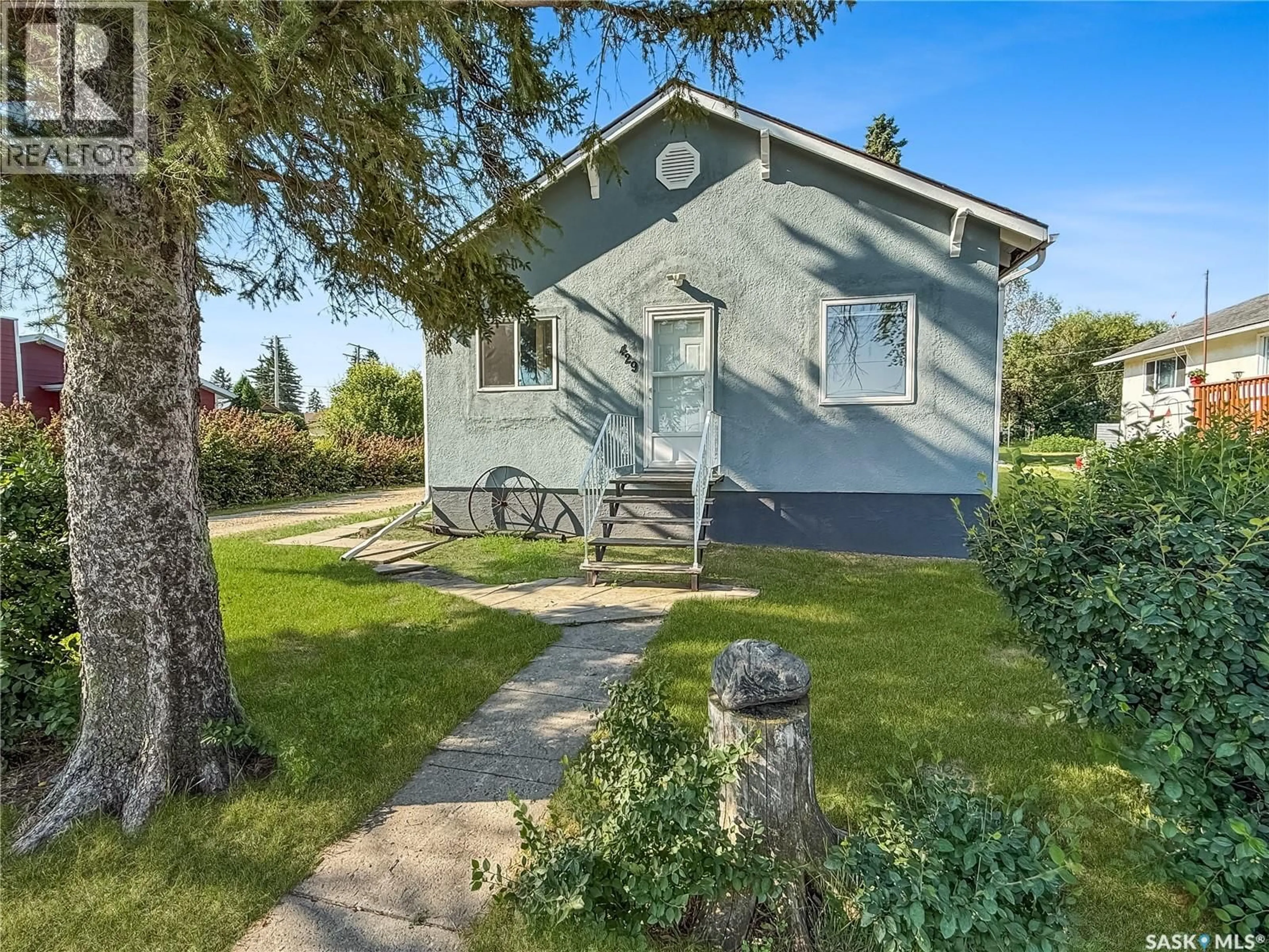 Home with vinyl exterior material, street for 429 SECOND STREET, Odessa Saskatchewan S0G3S0