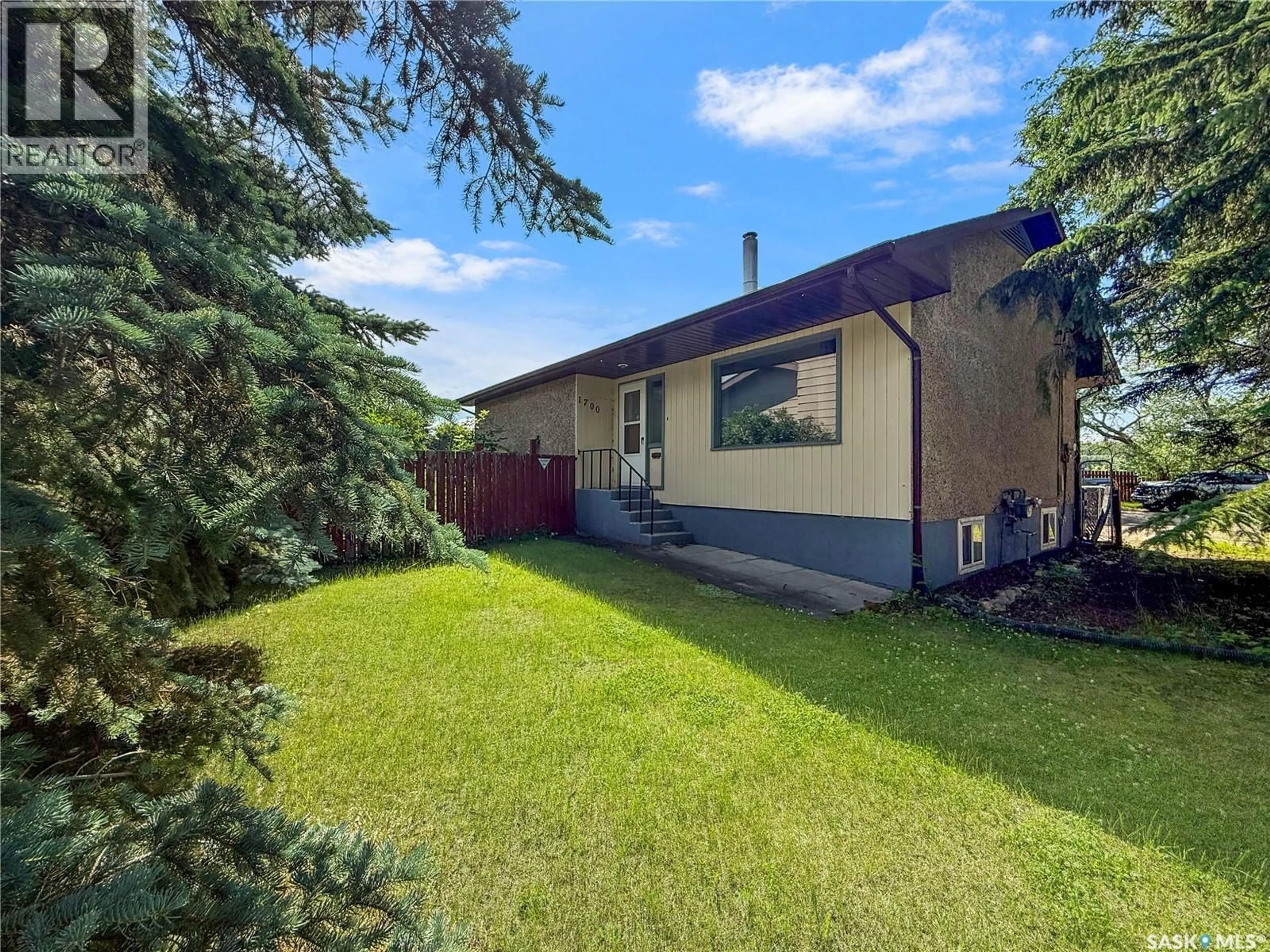 A pic from outside/outdoor area/front of a property/back of a property/a pic from drone, street for 1700 15TH AVENUE, Prince Albert Saskatchewan S6V5P3