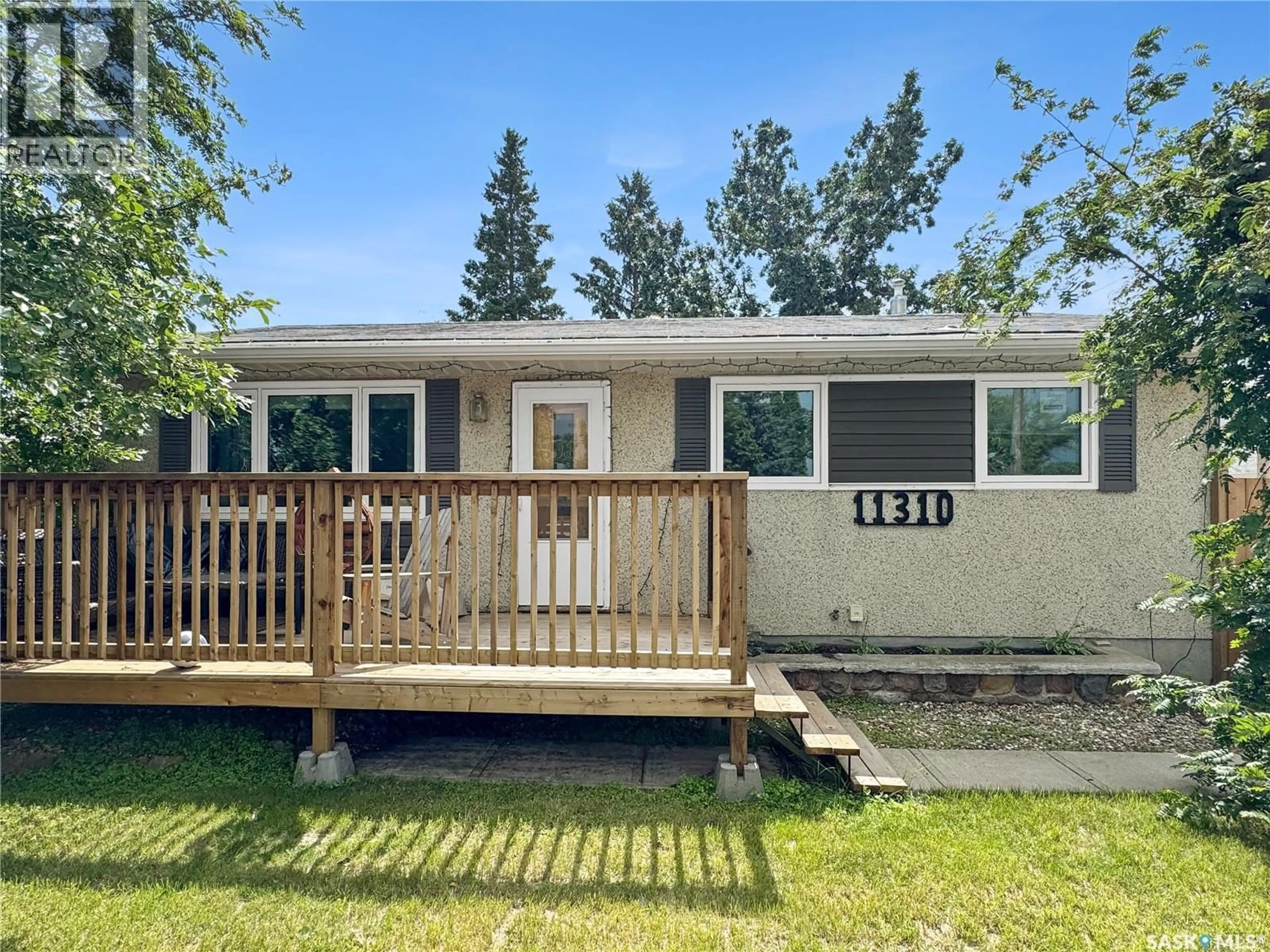 Home with vinyl exterior material, unknown for 11310 ASQUITH AVENUE, North Battleford Saskatchewan S9A2N8