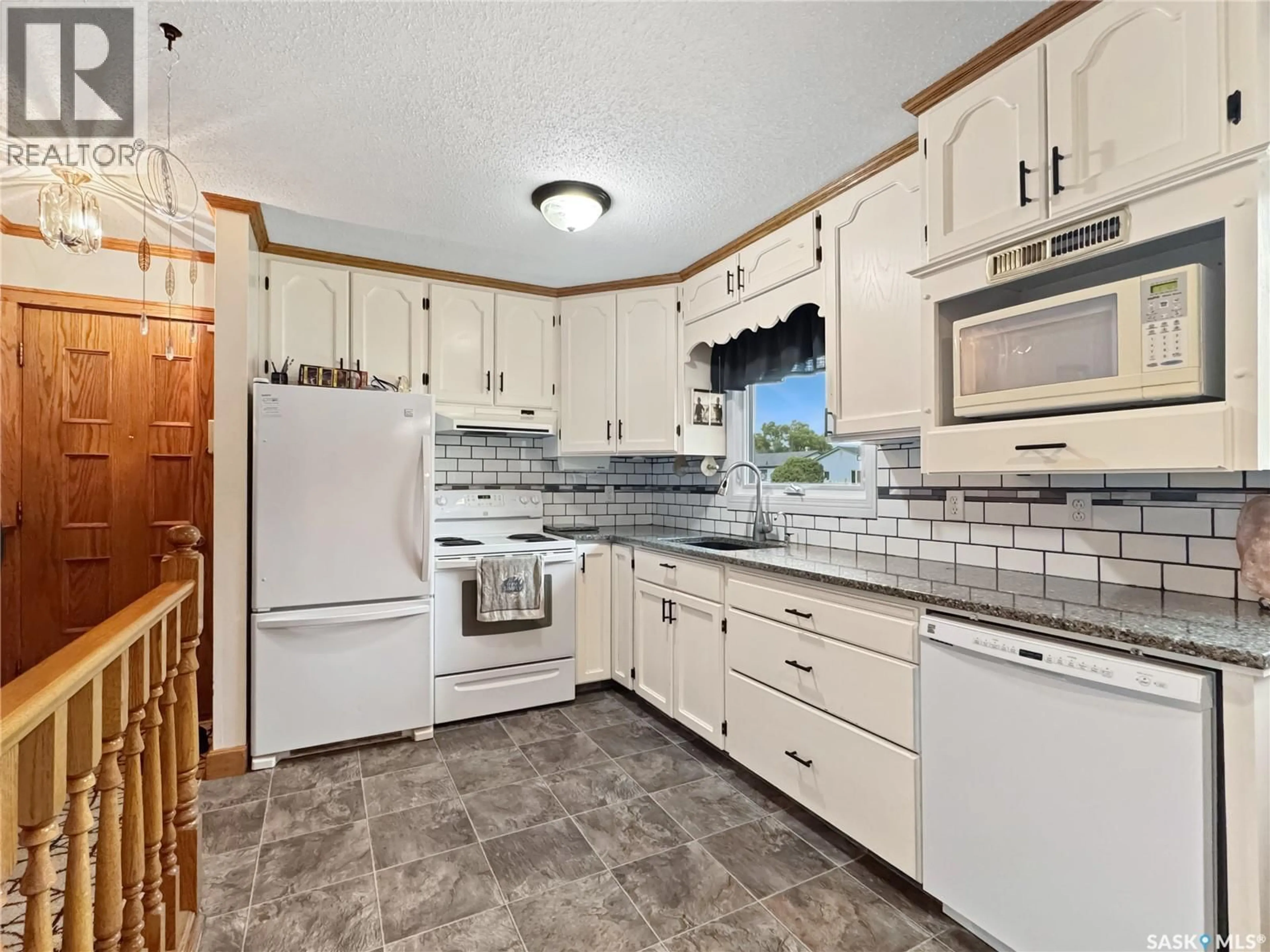Standard kitchen, ceramic/tile floor for 11310 ASQUITH AVENUE, North Battleford Saskatchewan S9A2N8