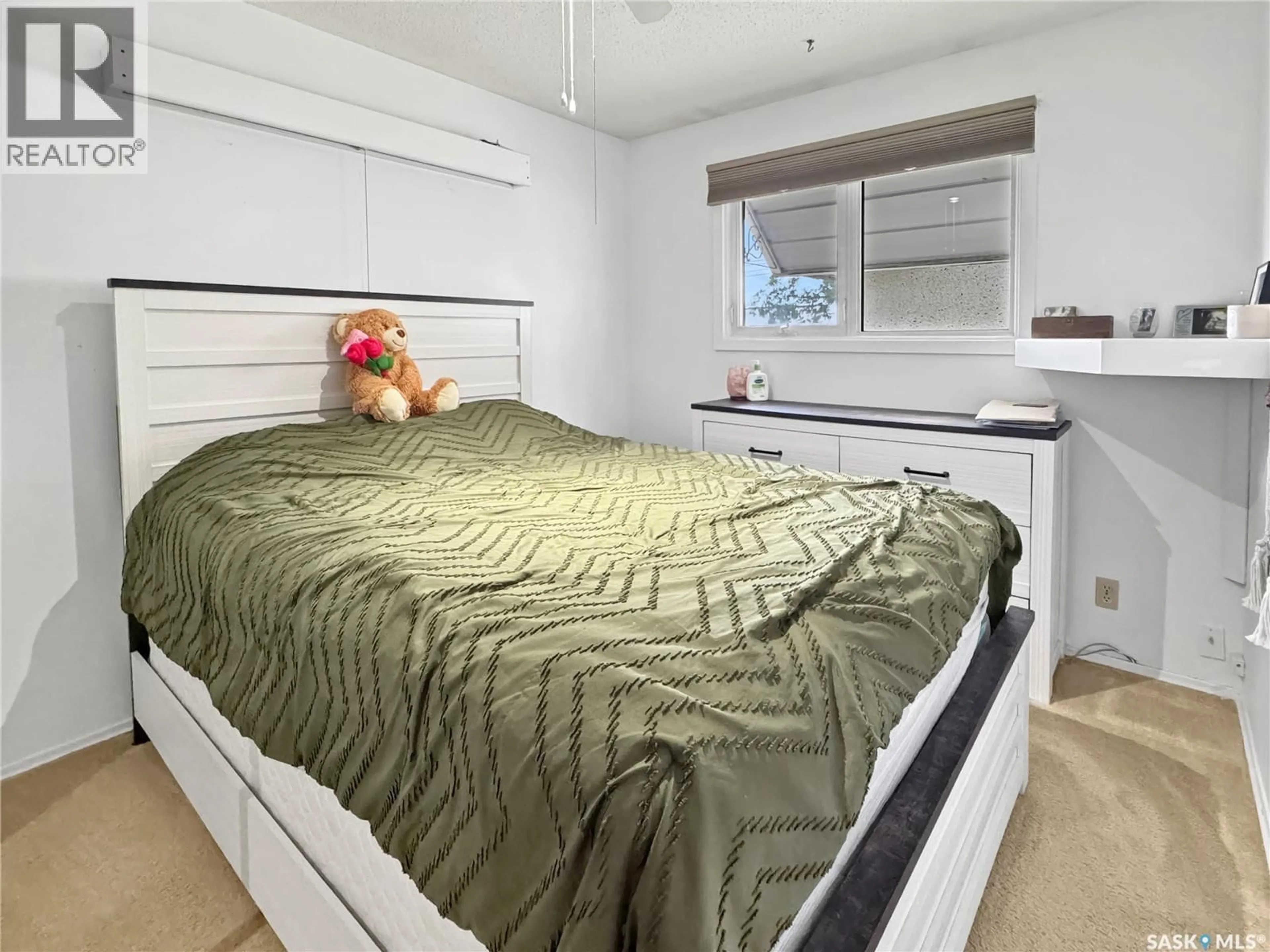 Bedroom with bed, unknown for 11310 ASQUITH AVENUE, North Battleford Saskatchewan S9A2N8