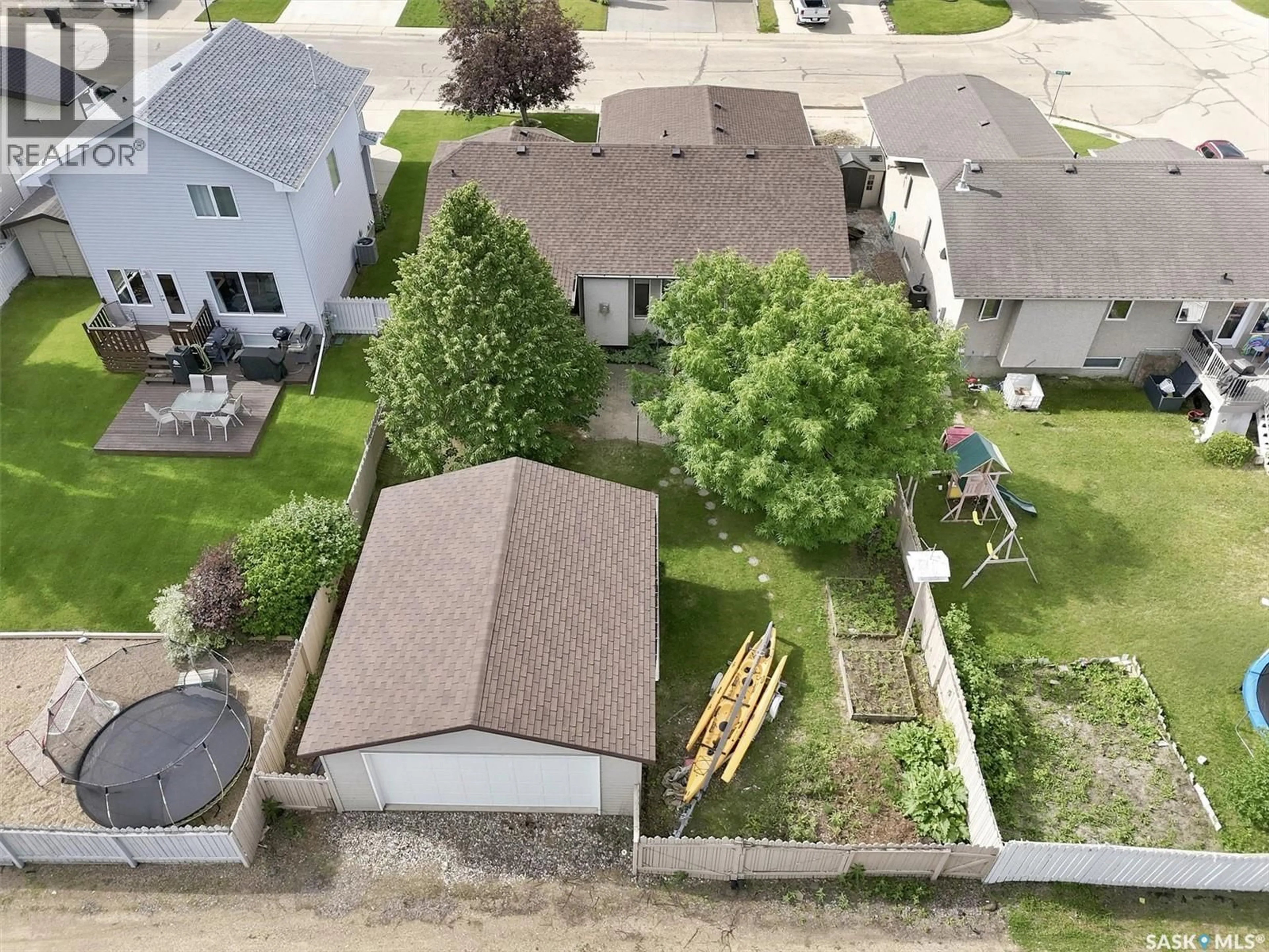 A pic from outside/outdoor area/front of a property/back of a property/a pic from drone, street for 841 MARTENS CRESCENT, Martensville Saskatchewan S0K2A0