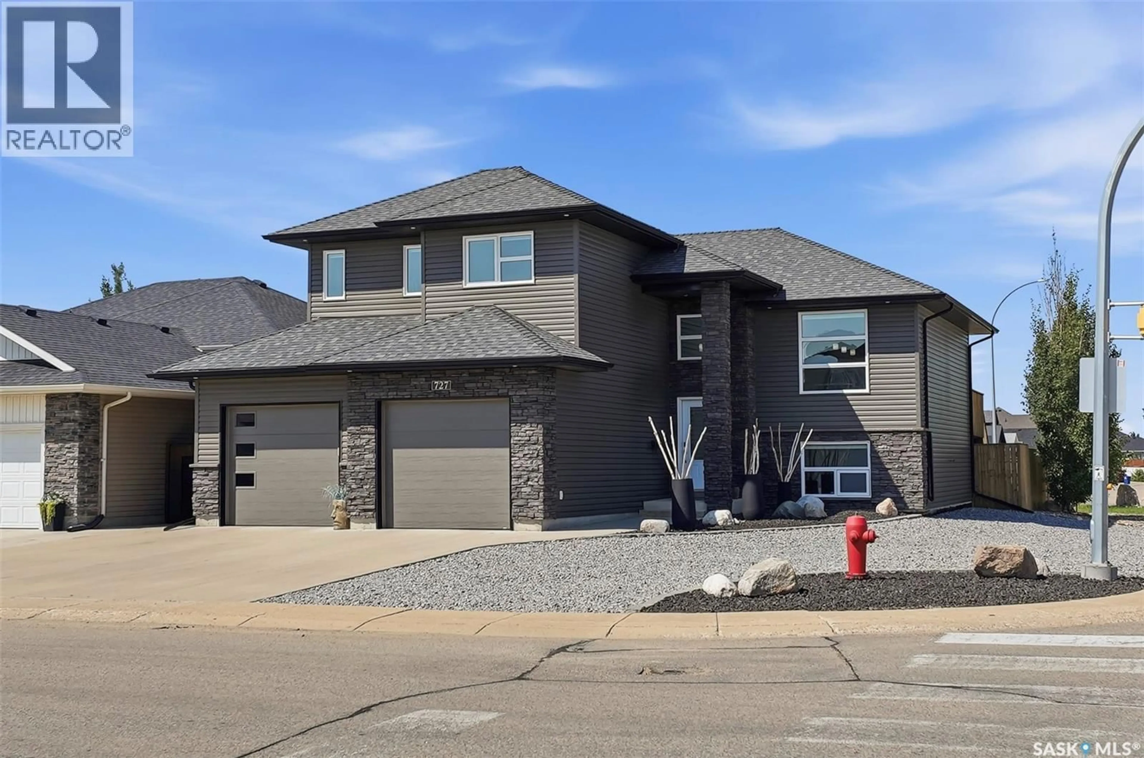 Home with brick exterior material, street for 727 1ST AVENUE, Warman Saskatchewan S0K4S2