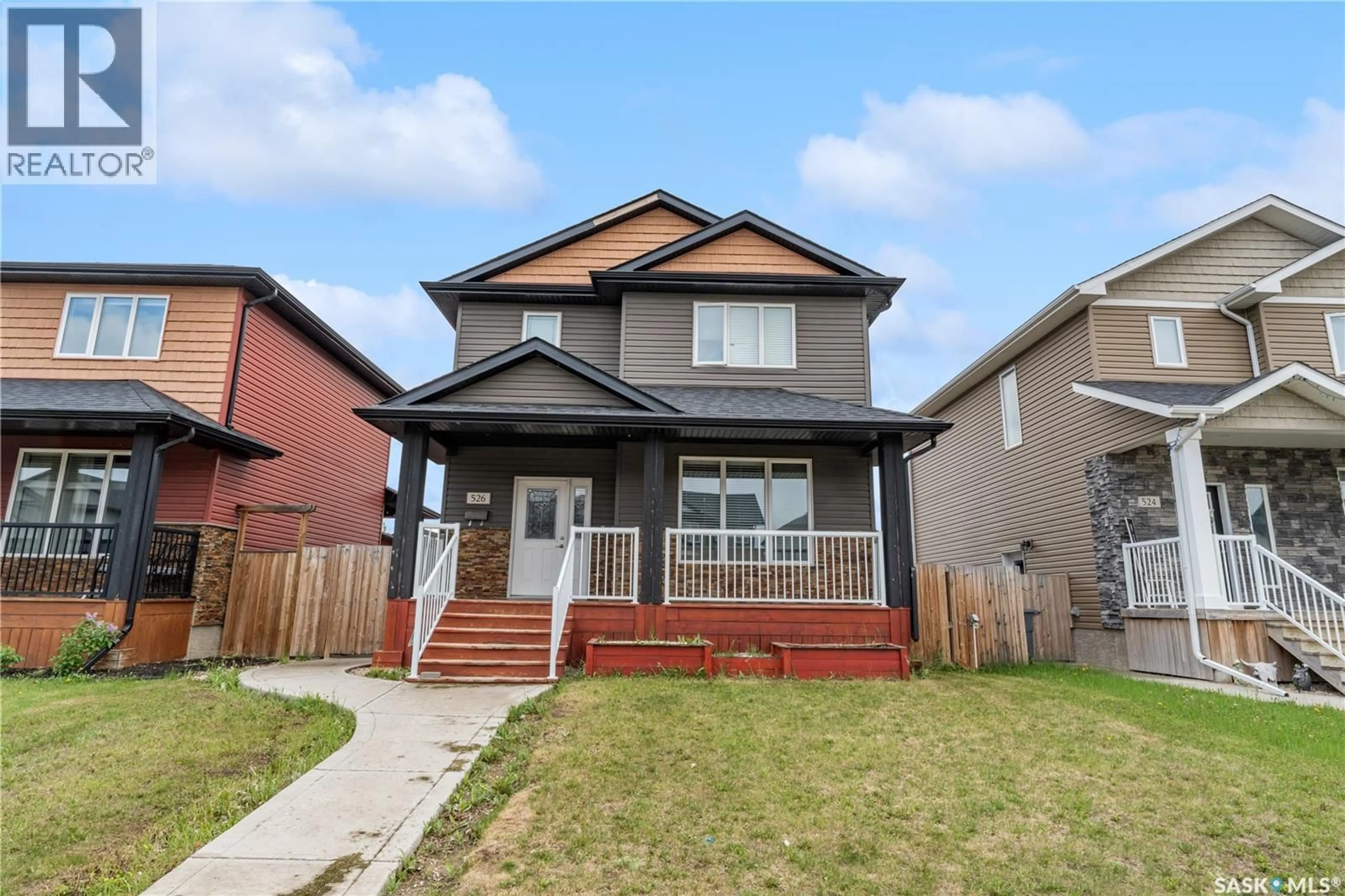 Home with vinyl exterior material, street for 526 MAPLE CRESCENT, Warman Saskatchewan S0K4S2