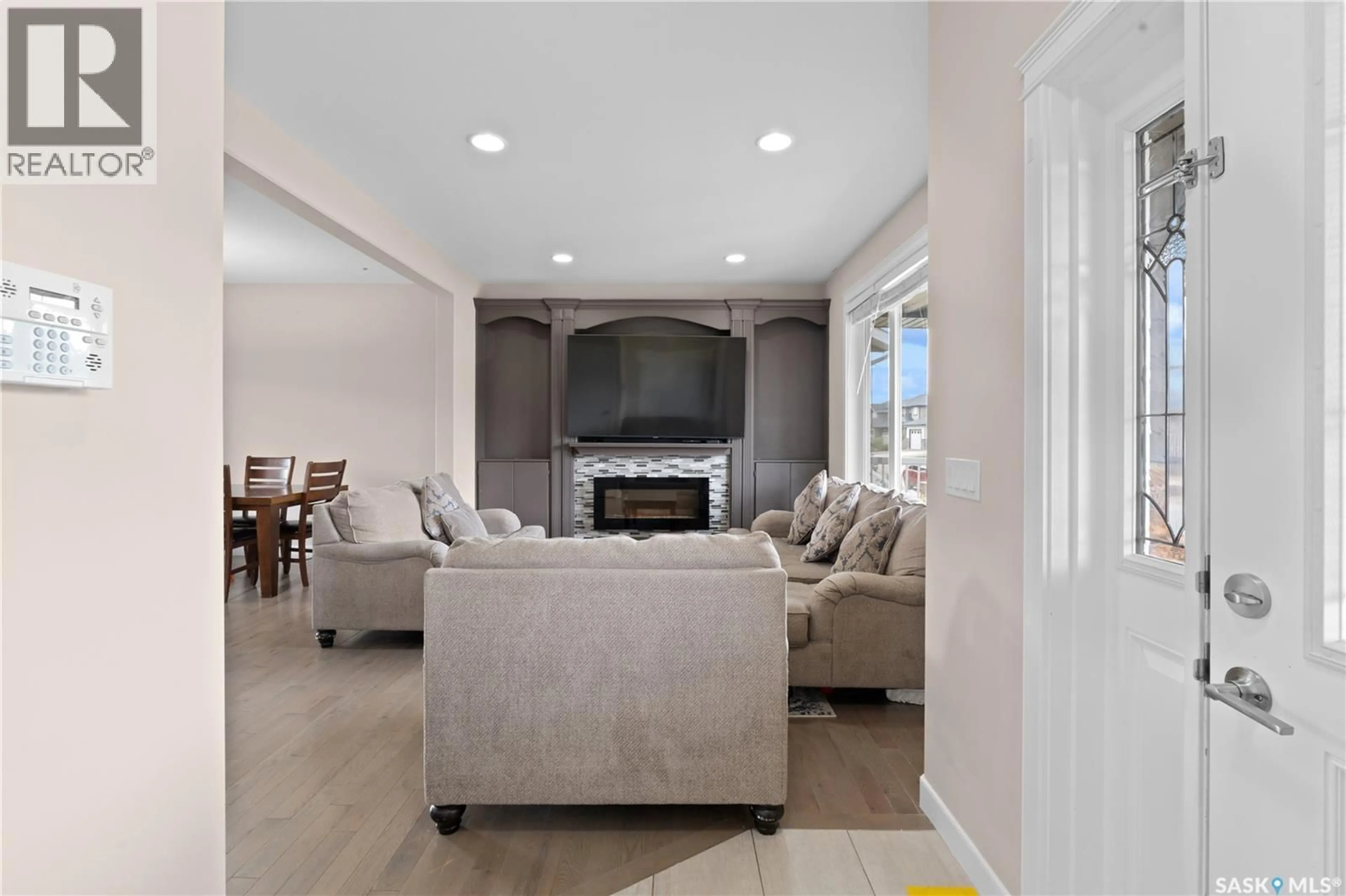 Living room with furniture, ceramic/tile floor for 526 MAPLE CRESCENT, Warman Saskatchewan S0K4S2