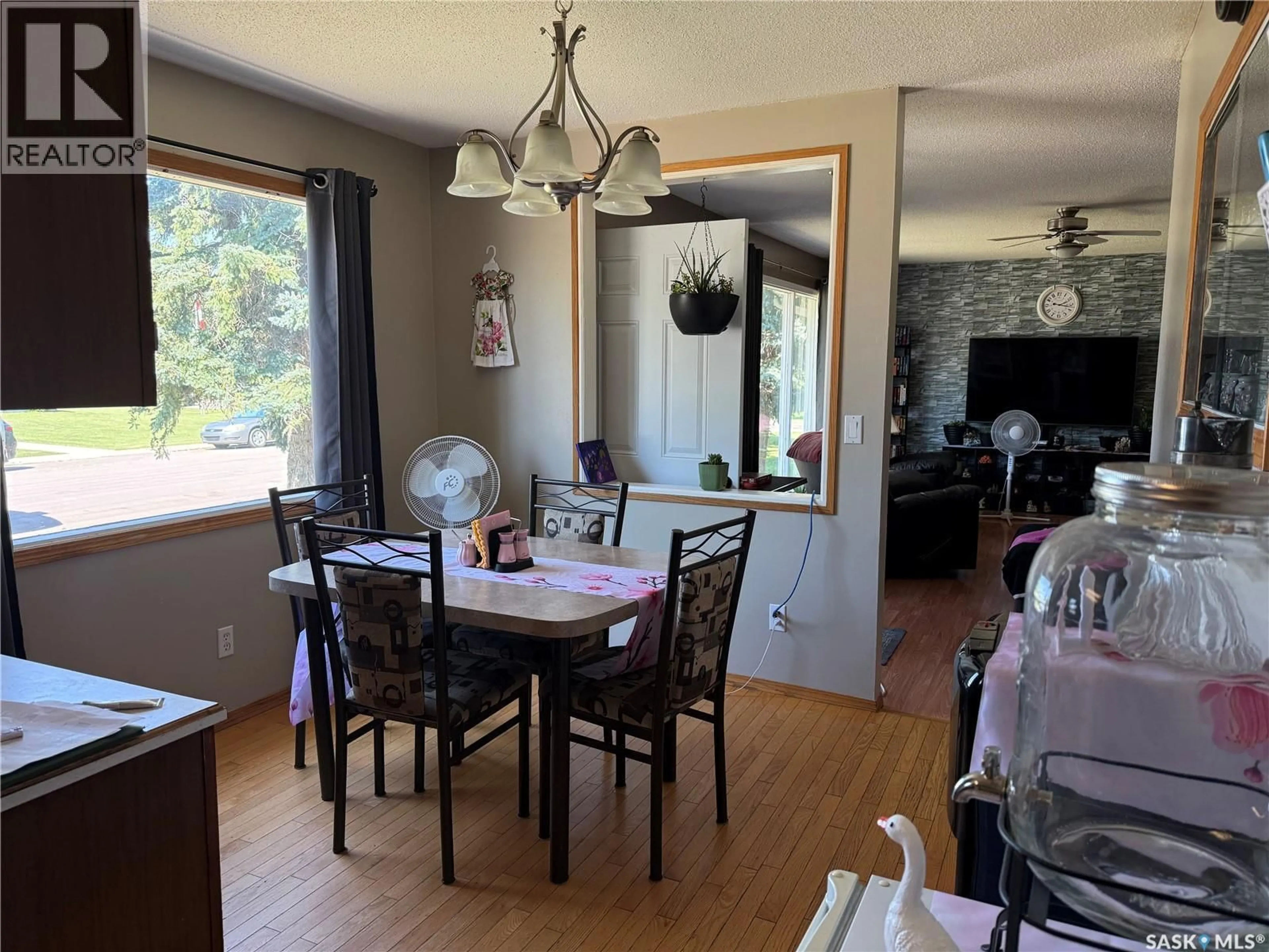 Dining room, wood/laminate floor for 409 MCKAY STREET, Radville Saskatchewan S0C2G0