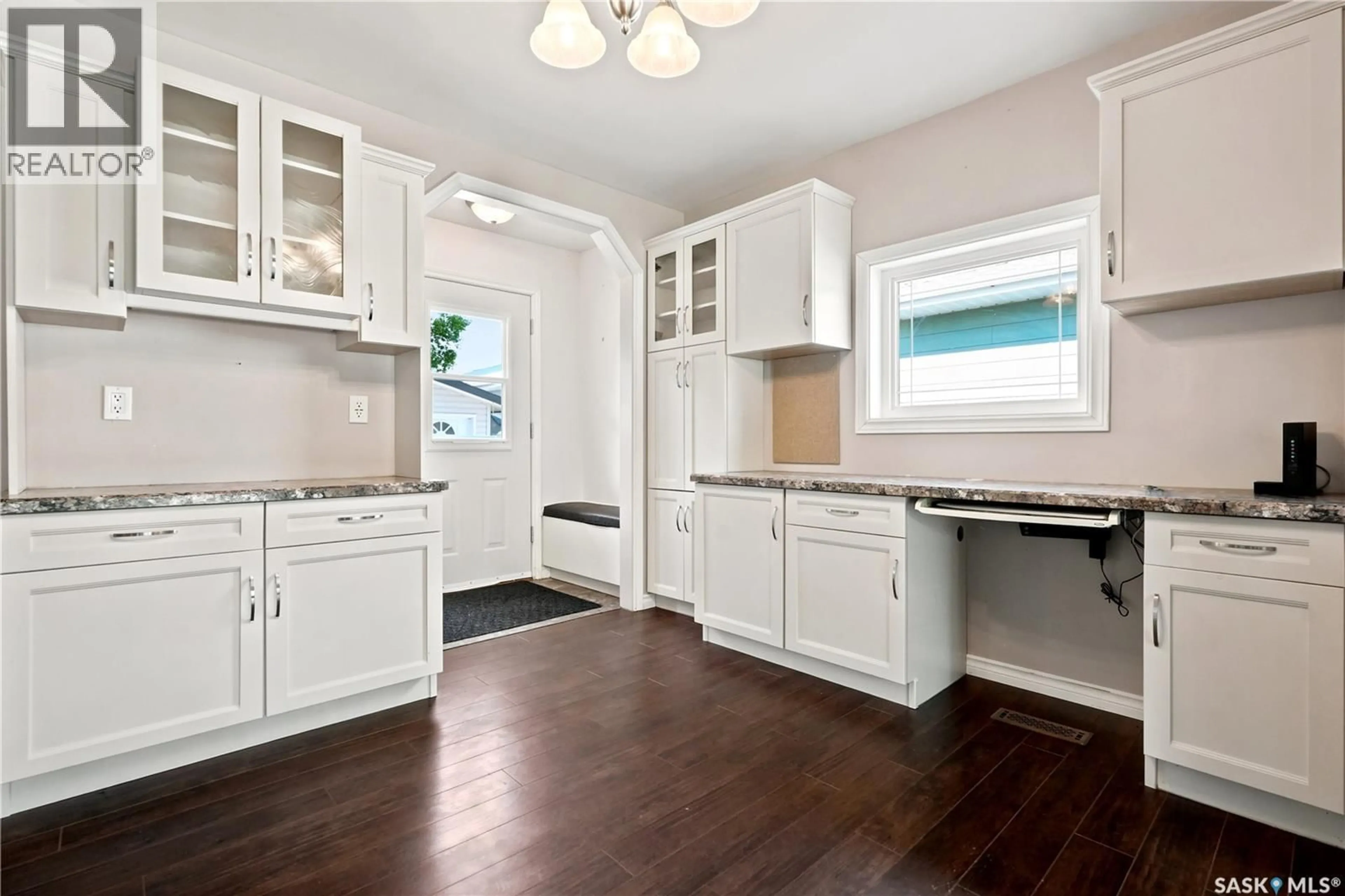 Open concept kitchen, wood/laminate floor for 314 GASTLE STREET, Strasbourg Saskatchewan S0G4V0