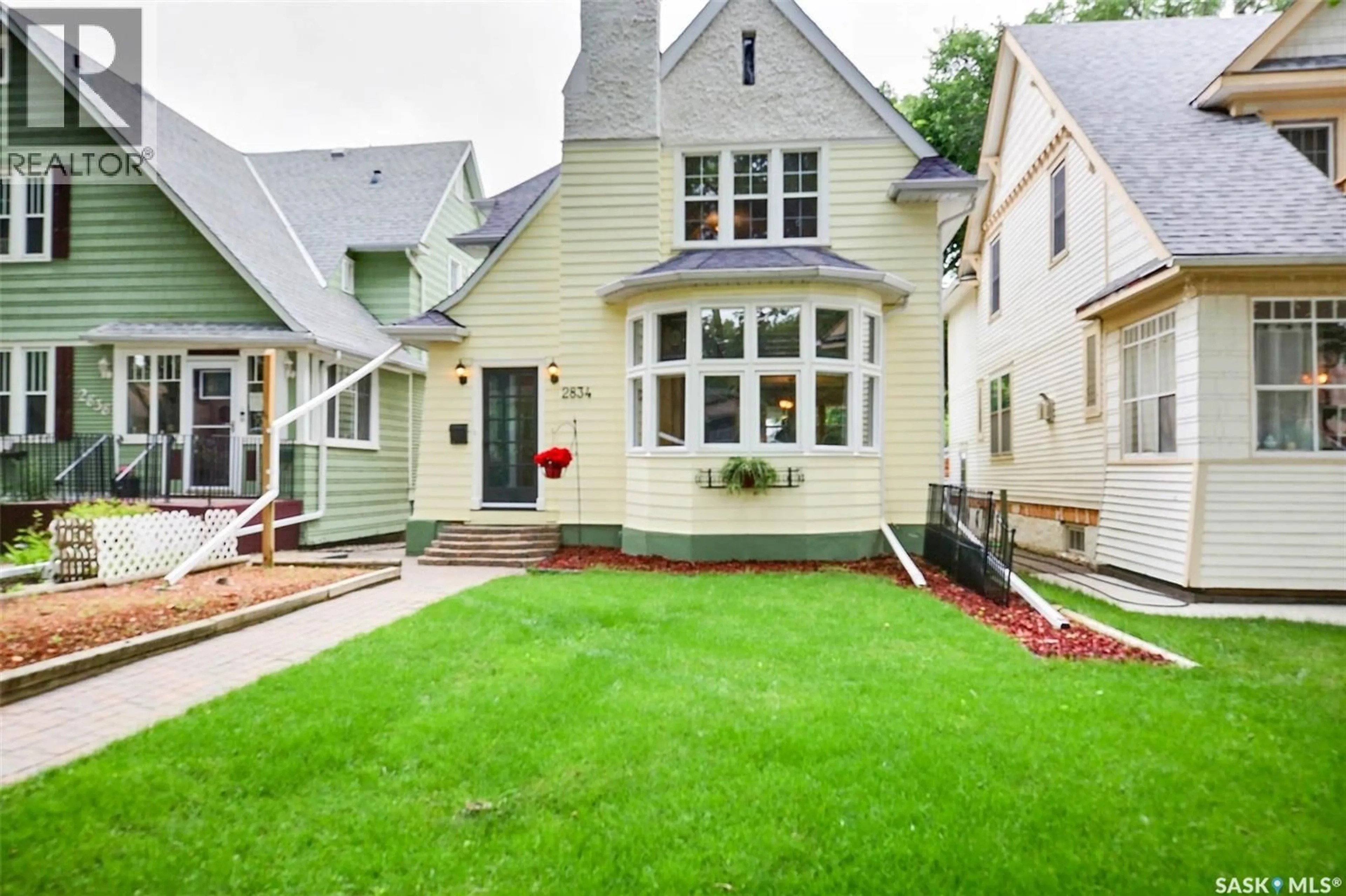 Home with vinyl exterior material, street for 2834 RAE STREET, Regina Saskatchewan S4S1R3