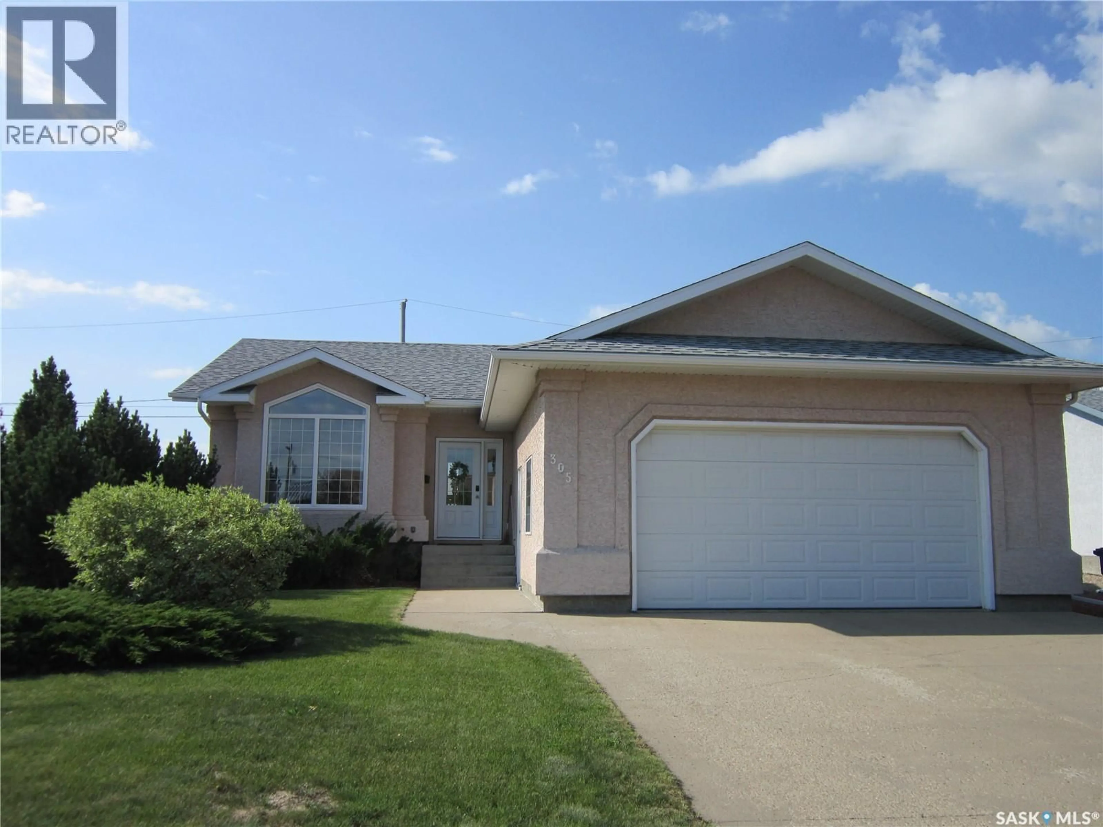 Home with vinyl exterior material, street for 305 VENNE STREET, Wakaw Saskatchewan S0K4P0