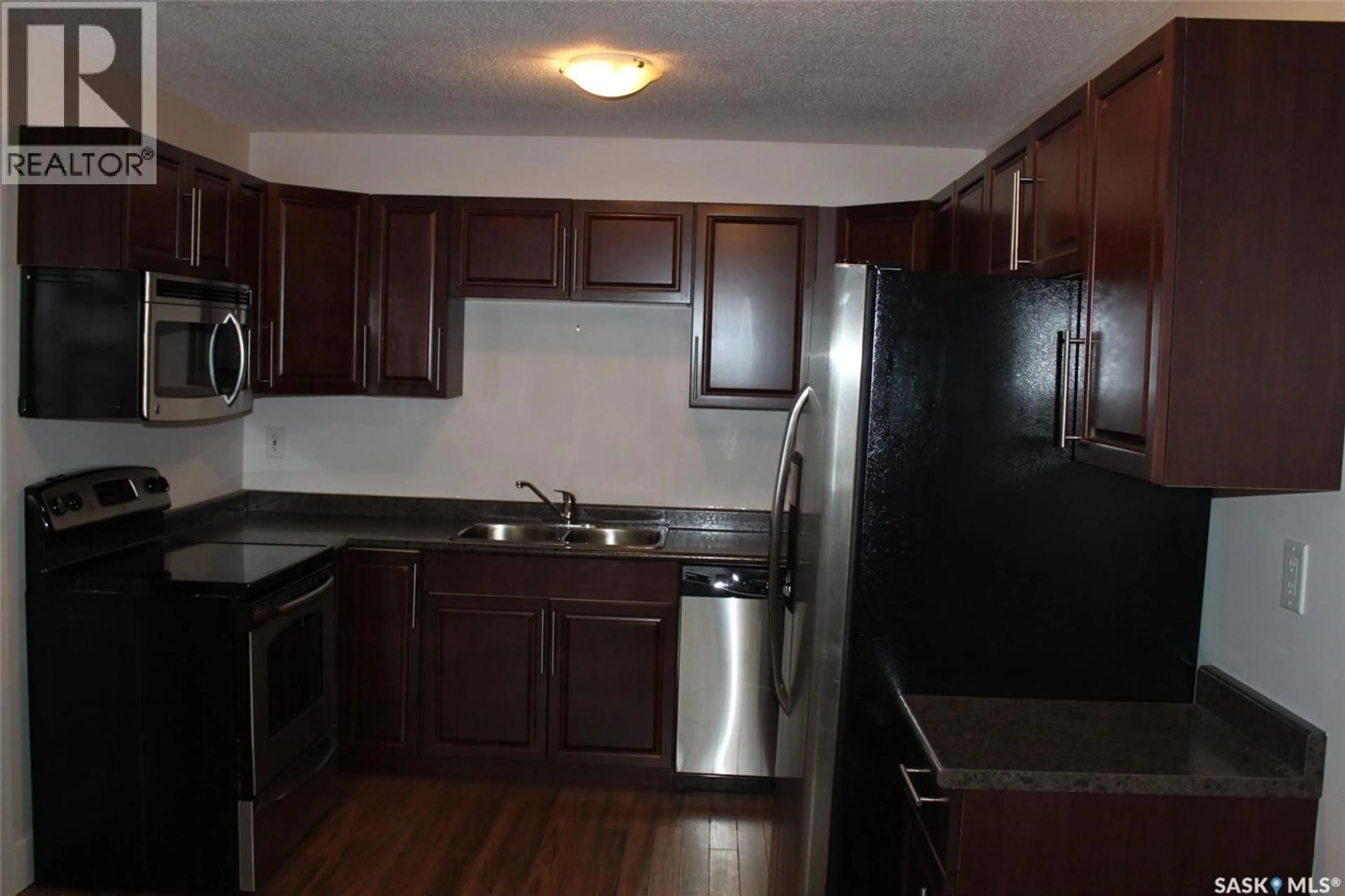 Standard kitchen, wood/laminate floor for 2106 - 2 STE CECILIA AVENUE, Saskatoon Saskatchewan S7M0P2