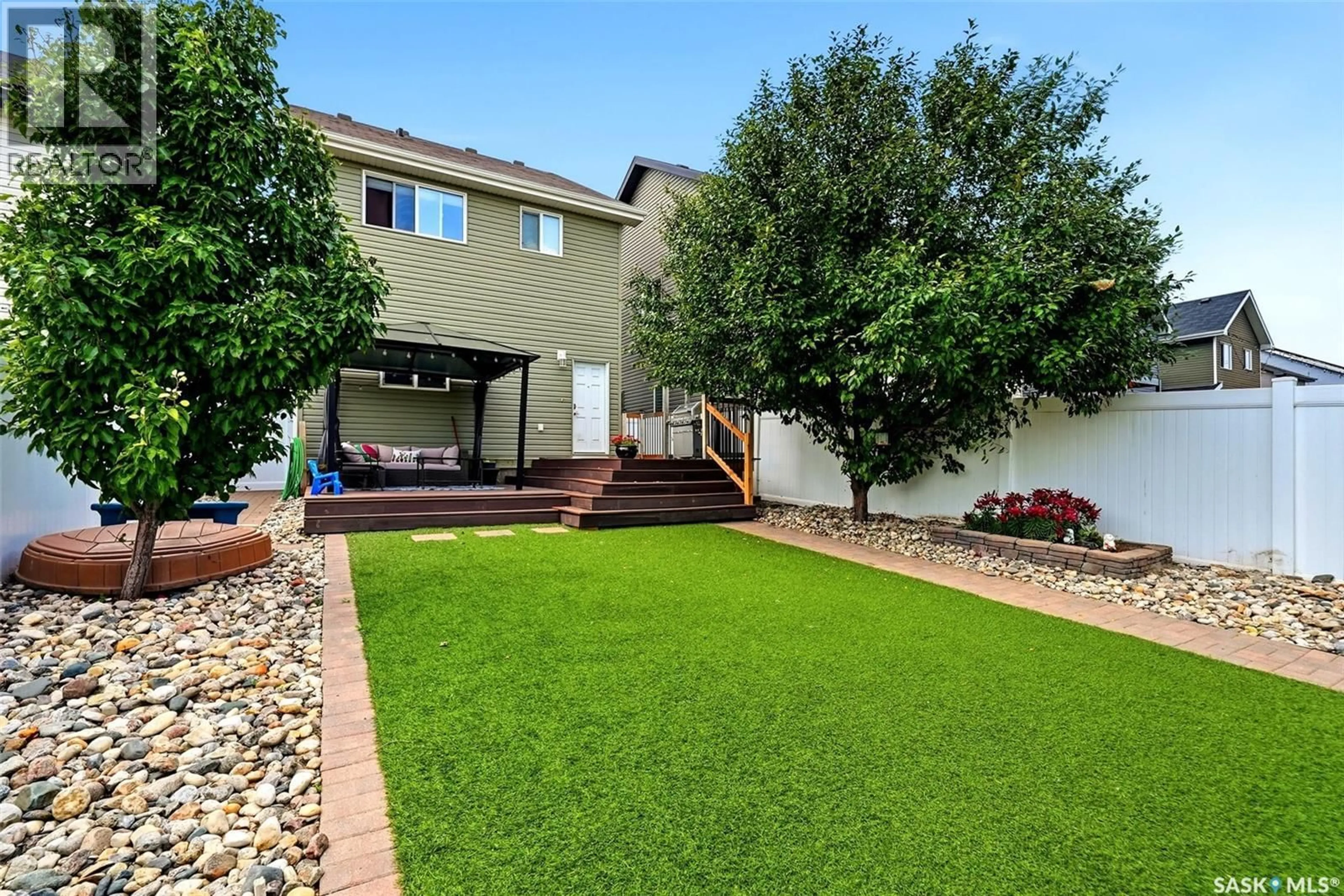 A pic from outside/outdoor area/front of a property/back of a property/a pic from drone, street for 3660 GREEN MOSS LANE, Regina Saskatchewan S4V1M2