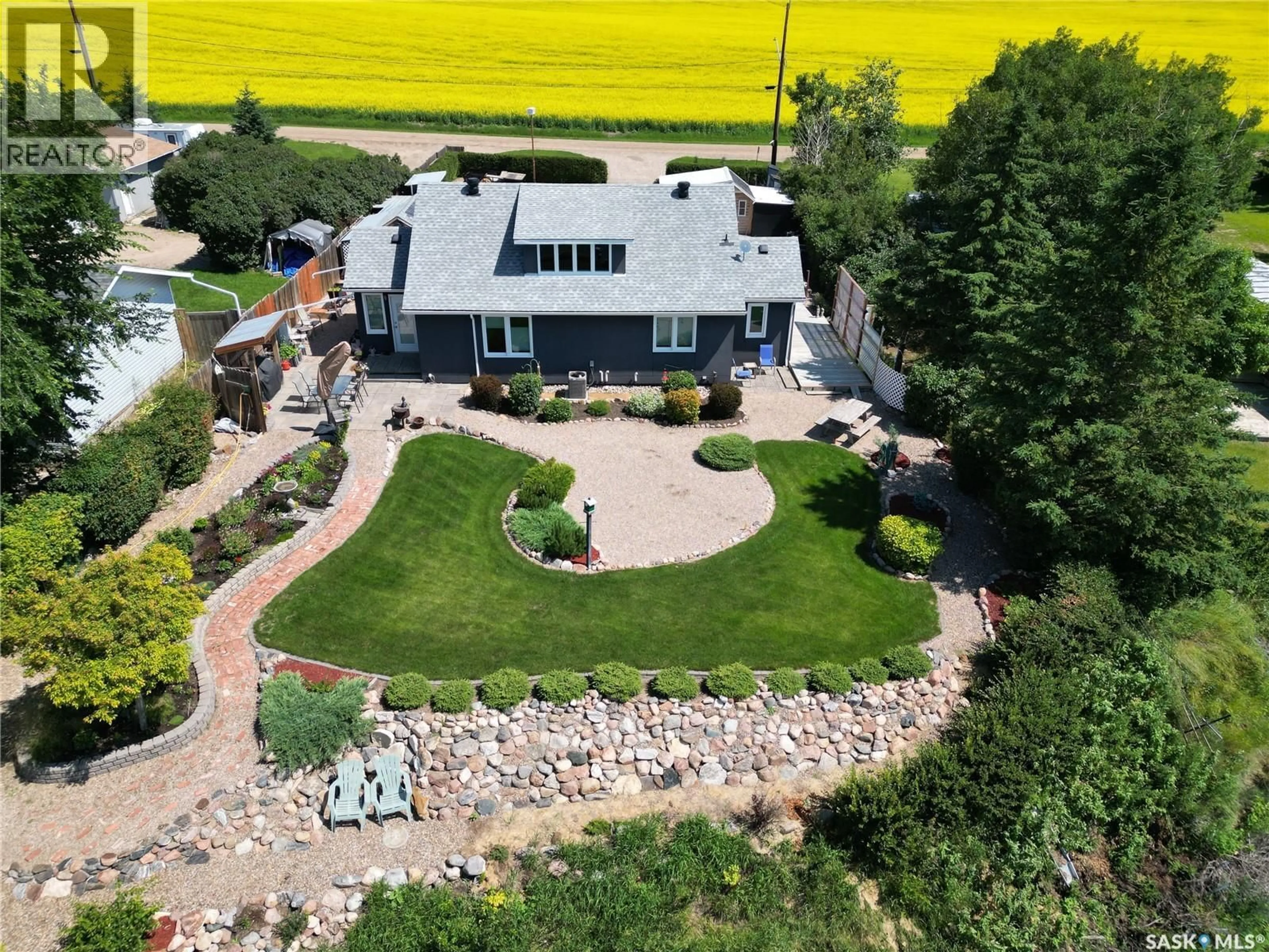 A pic from outside/outdoor area/front of a property/back of a property/a pic from drone, mountain view for 5 SUMMERFIELD DRIVE, Jackfish Lake Saskatchewan S0M0L0