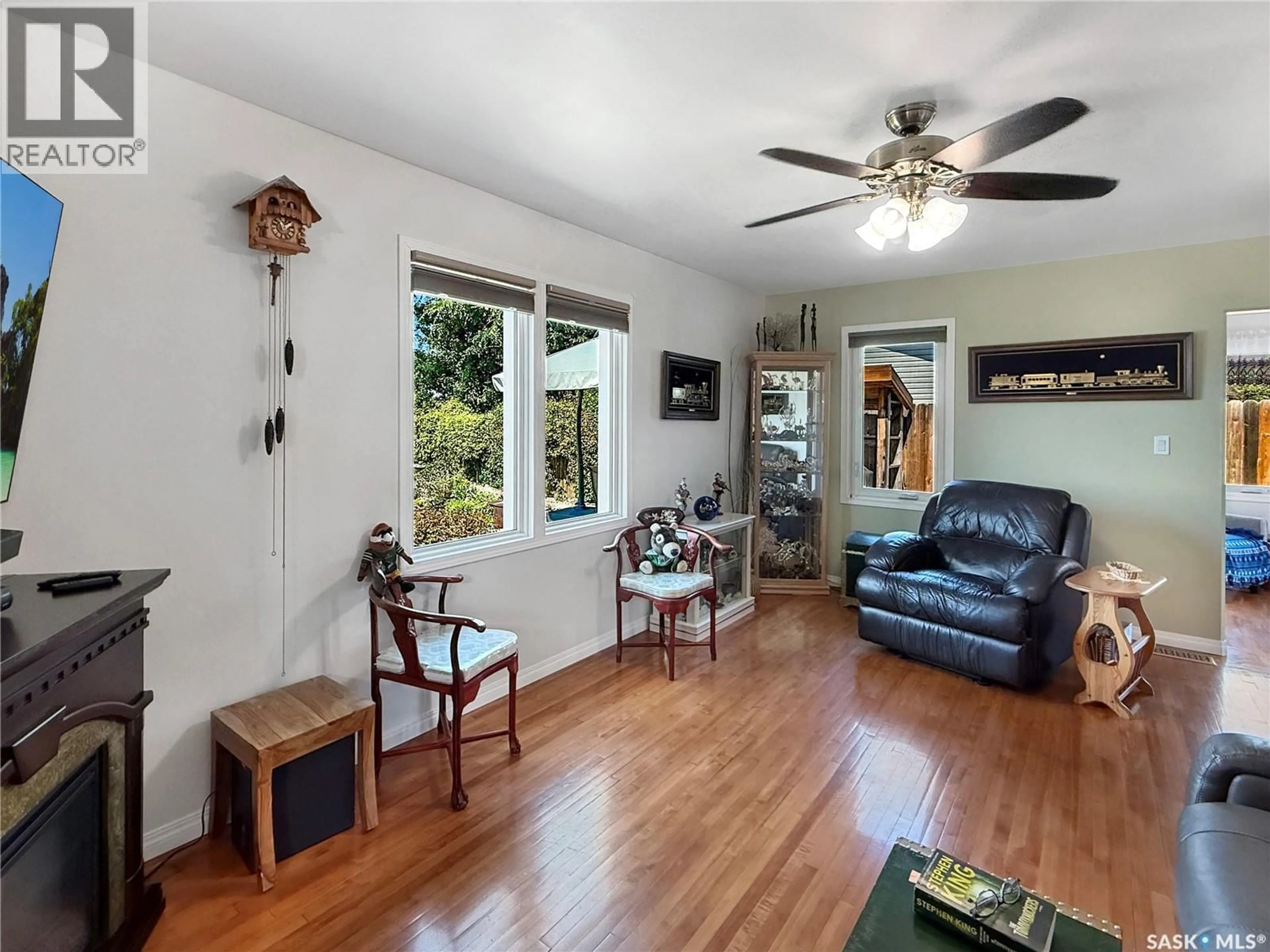 Living room with furniture, wood/laminate floor for 5 SUMMERFIELD DRIVE, Jackfish Lake Saskatchewan S0M0L0