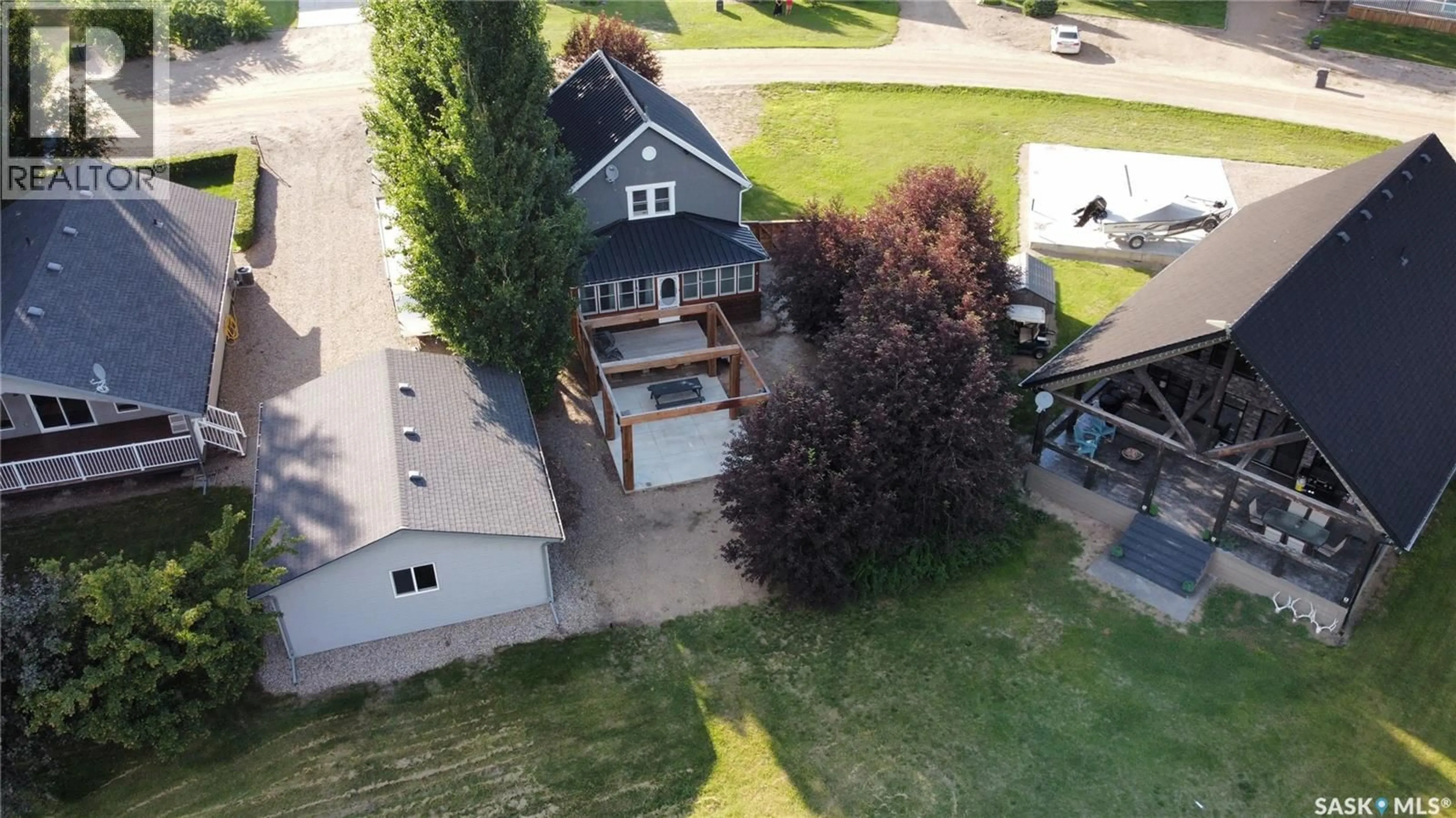 A pic from outside/outdoor area/front of a property/back of a property/a pic from drone, unknown for 522 VIVIAN BAY, Lake Diefenbaker Saskatchewan S0L0G0