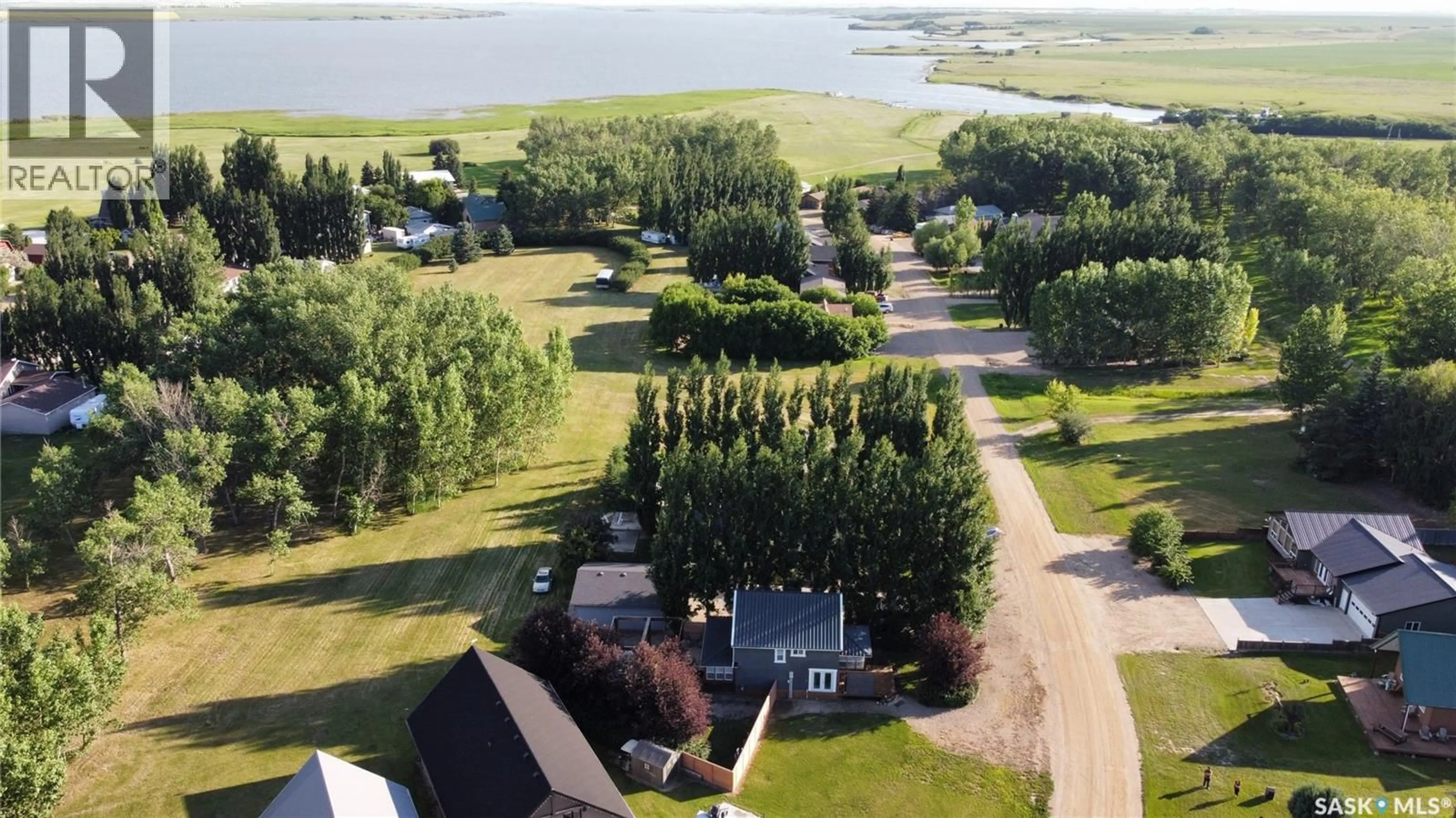 A pic from outside/outdoor area/front of a property/back of a property/a pic from drone, water/lake/river/ocean view for 522 VIVIAN BAY, Lake Diefenbaker Saskatchewan S0L0G0