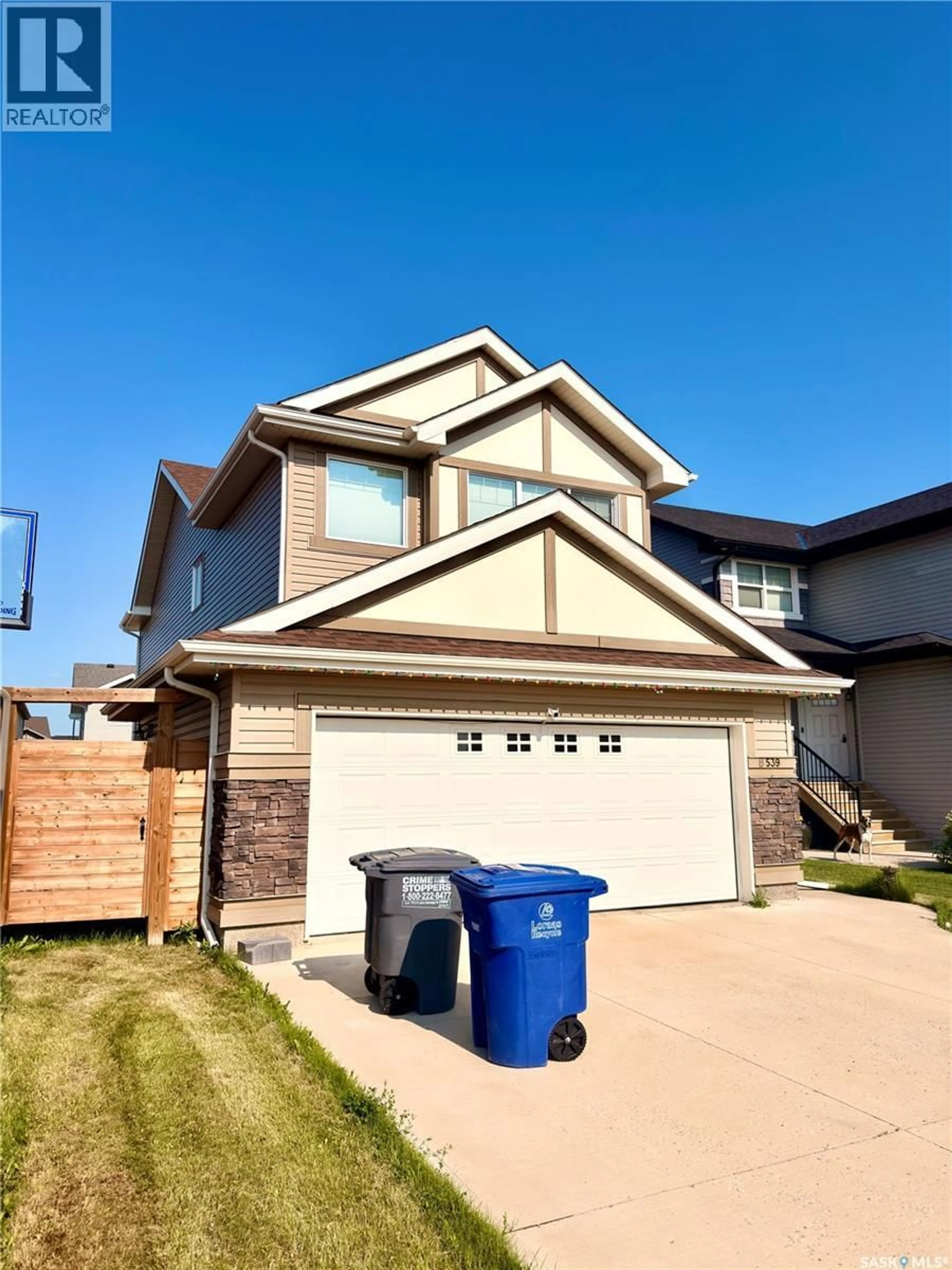 Home with vinyl exterior material, street for 539 SECORD MANOR, Saskatoon Saskatchewan S7V0M1