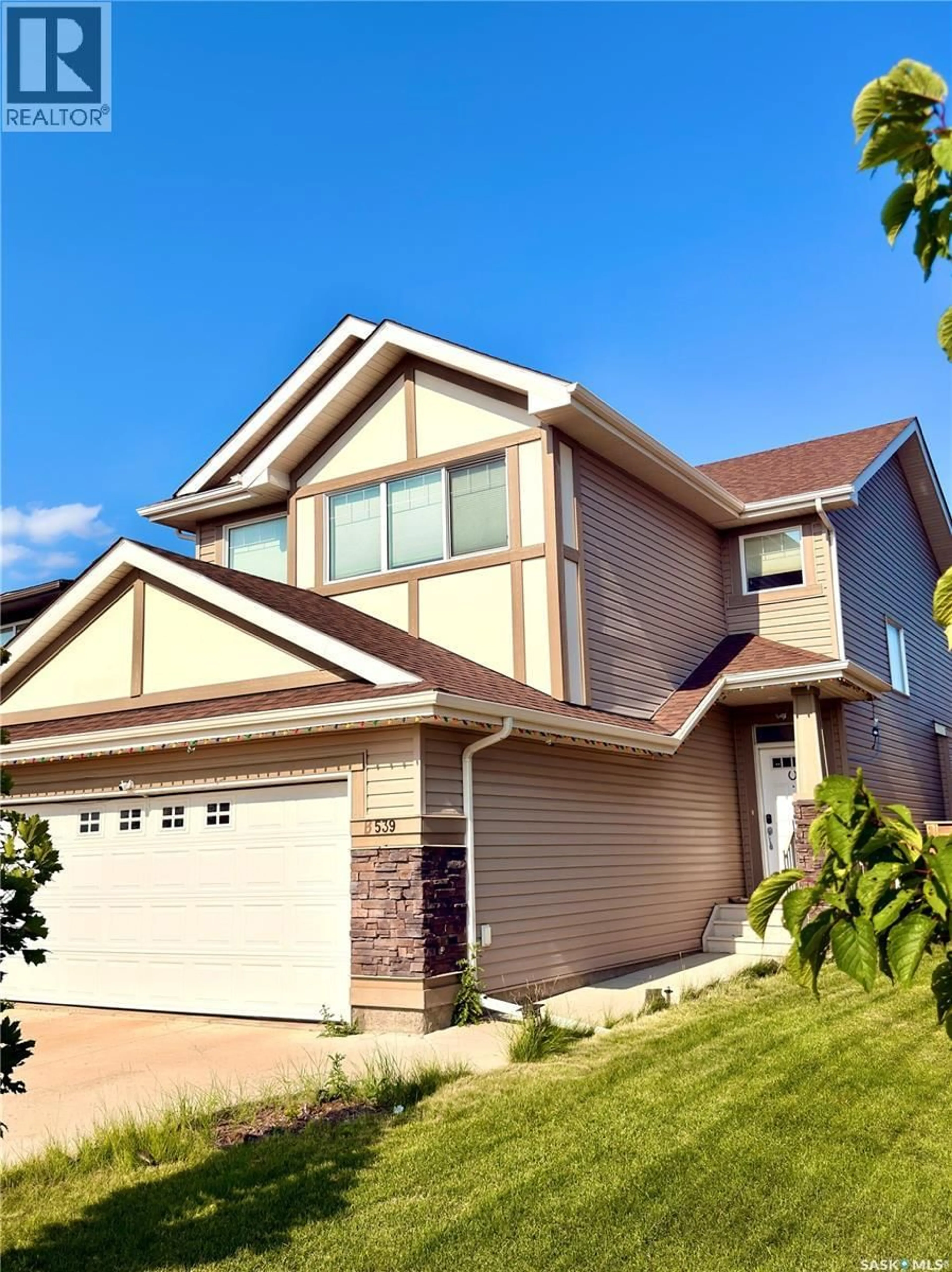 Home with vinyl exterior material, street for 539 SECORD MANOR, Saskatoon Saskatchewan S7V0M1