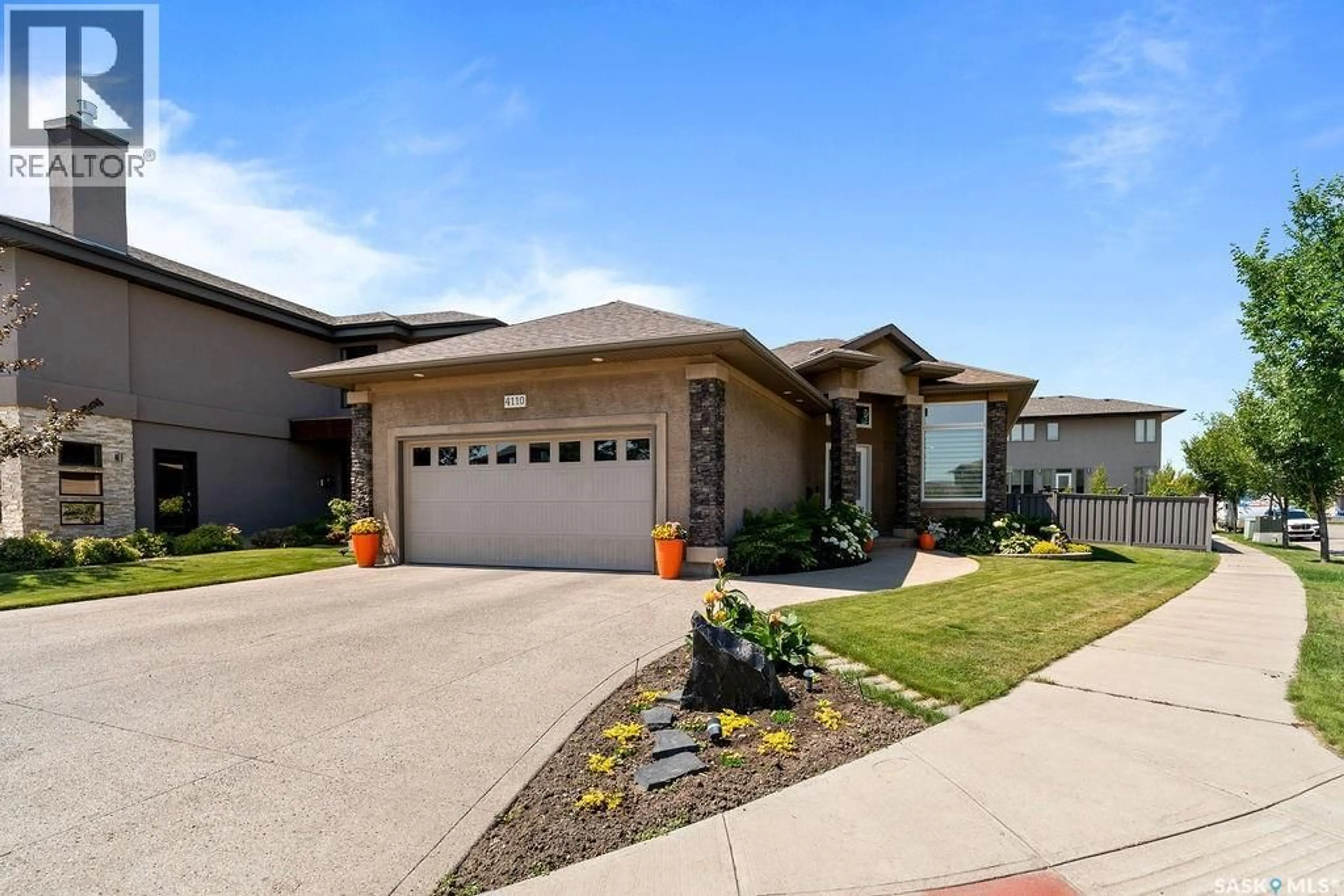 Home with brick exterior material, street for 4110 CHUKA DRIVE, Regina Saskatchewan S4V1N2