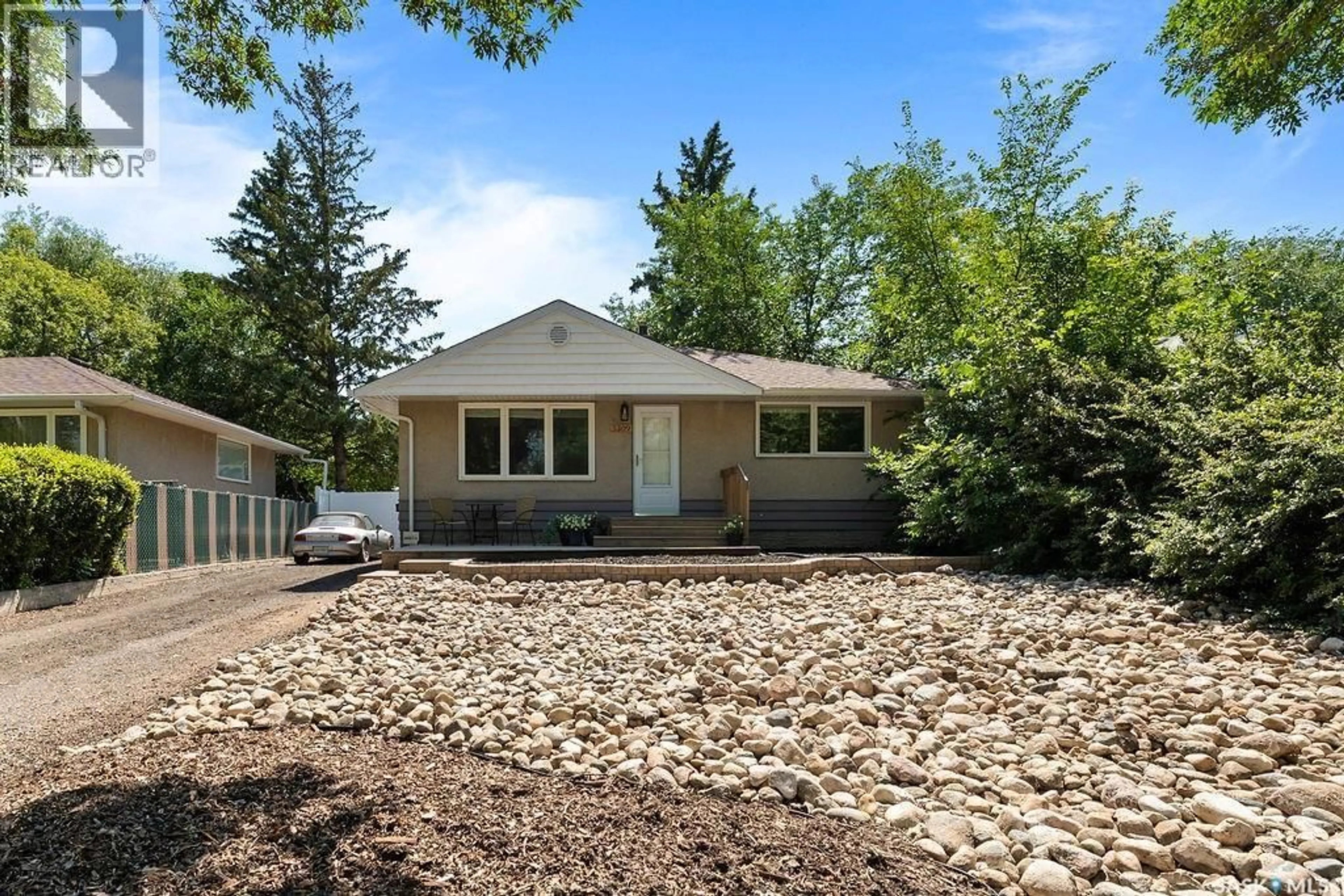 Home with vinyl exterior material, street for 5309 1ST AVENUE, Regina Saskatchewan S4T0A7