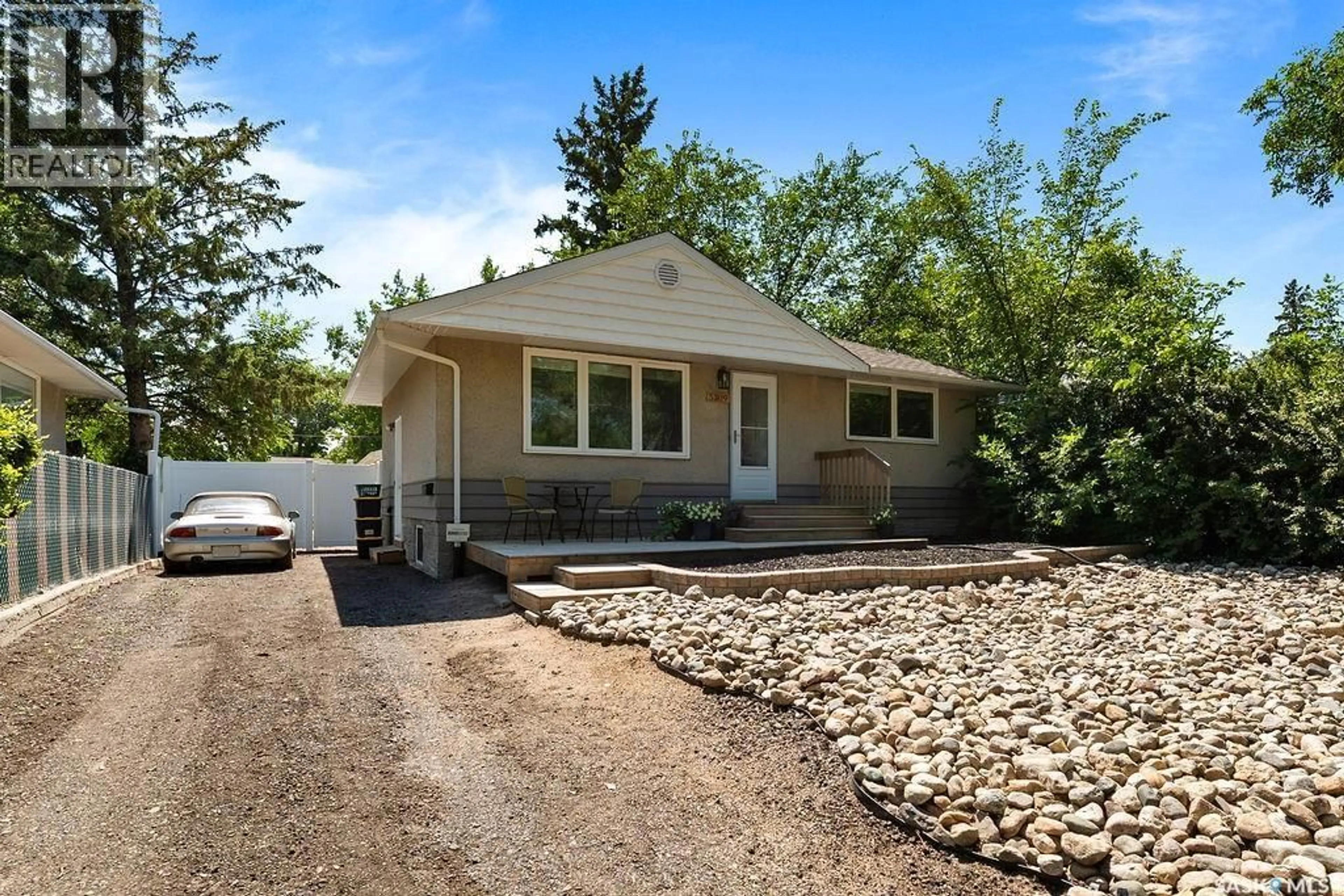 Home with vinyl exterior material, street for 5309 1ST AVENUE, Regina Saskatchewan S4T0A7
