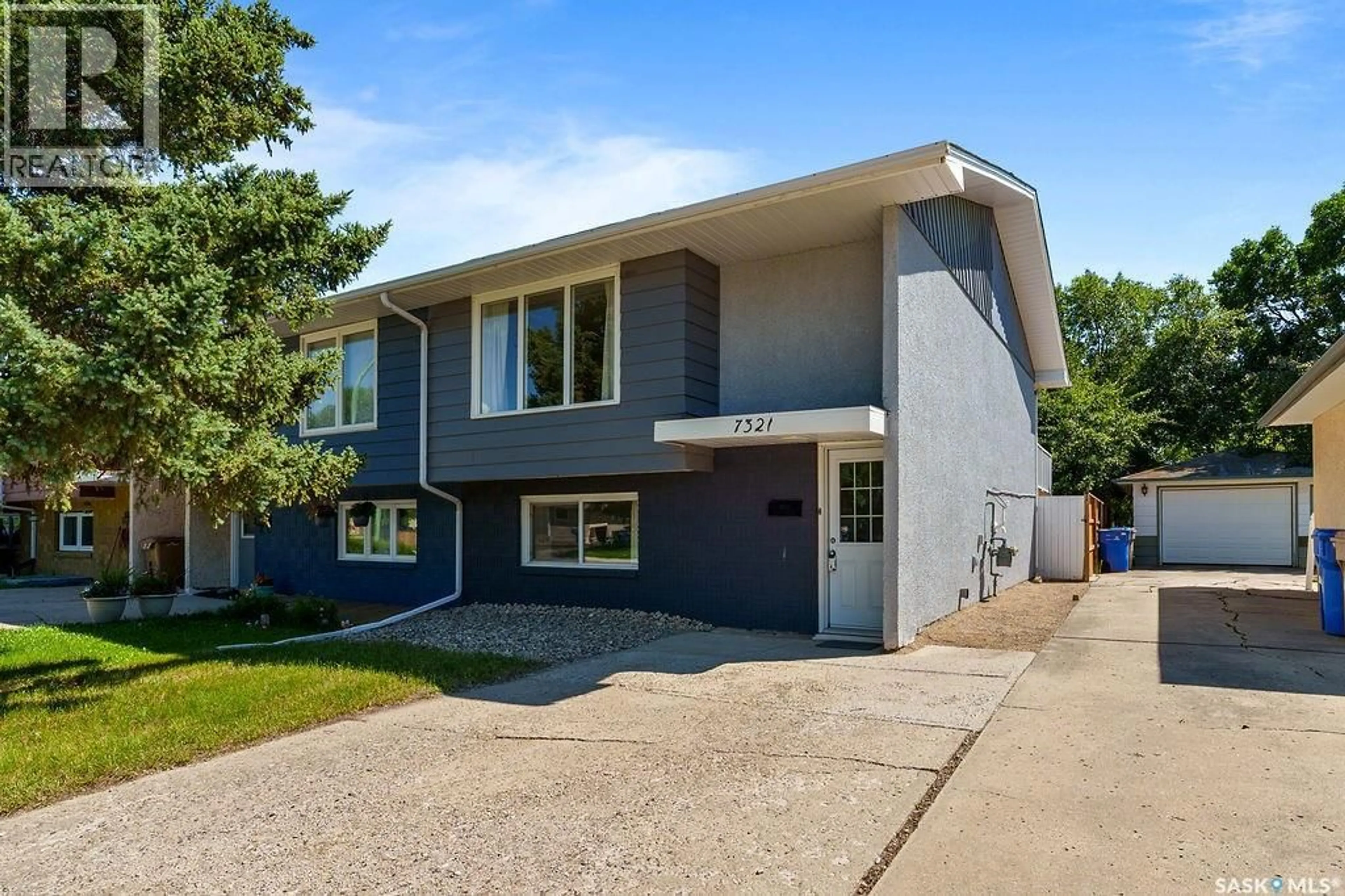 Home with vinyl exterior material, street for 7321 BOWMAN AVENUE, Regina Saskatchewan S4T6K9