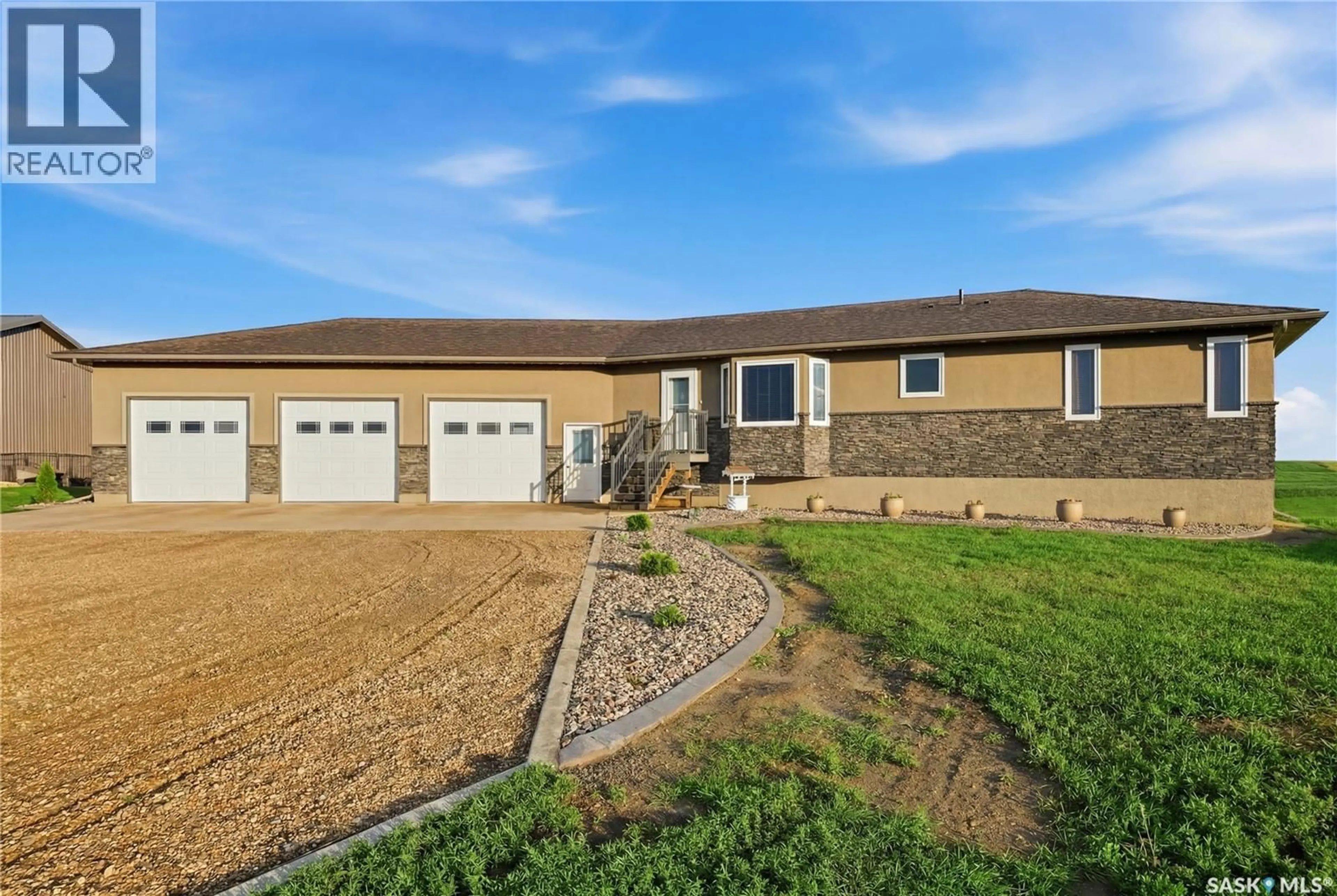 Home with vinyl exterior material, street for NEWSHAM ACREAGE, Wheatlands Rm No. 163 Saskatchewan S0H3E0
