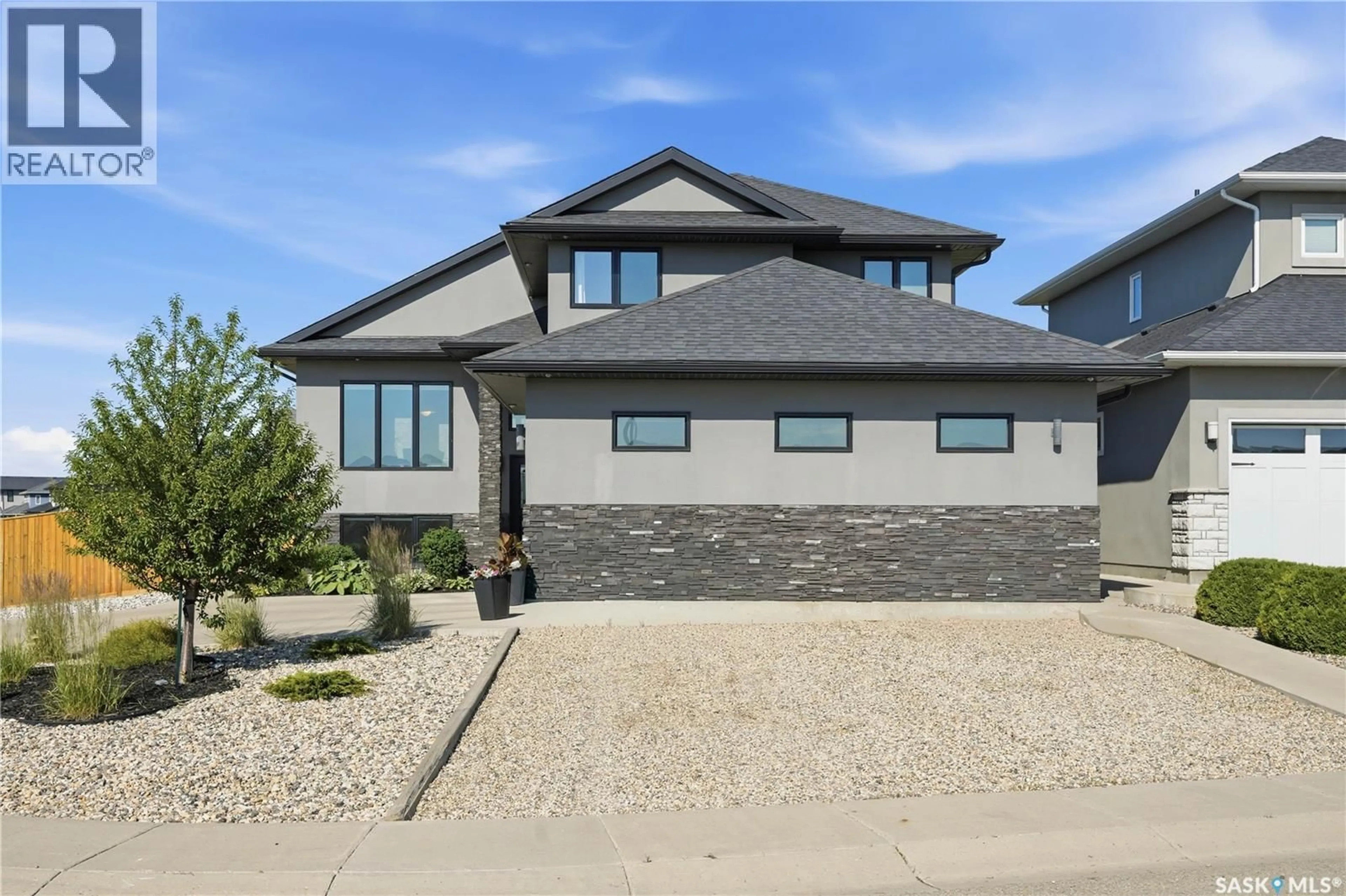 Home with brick exterior material, street for 822 WERSCHNER COURT, Saskatoon Saskatchewan S7V0A7