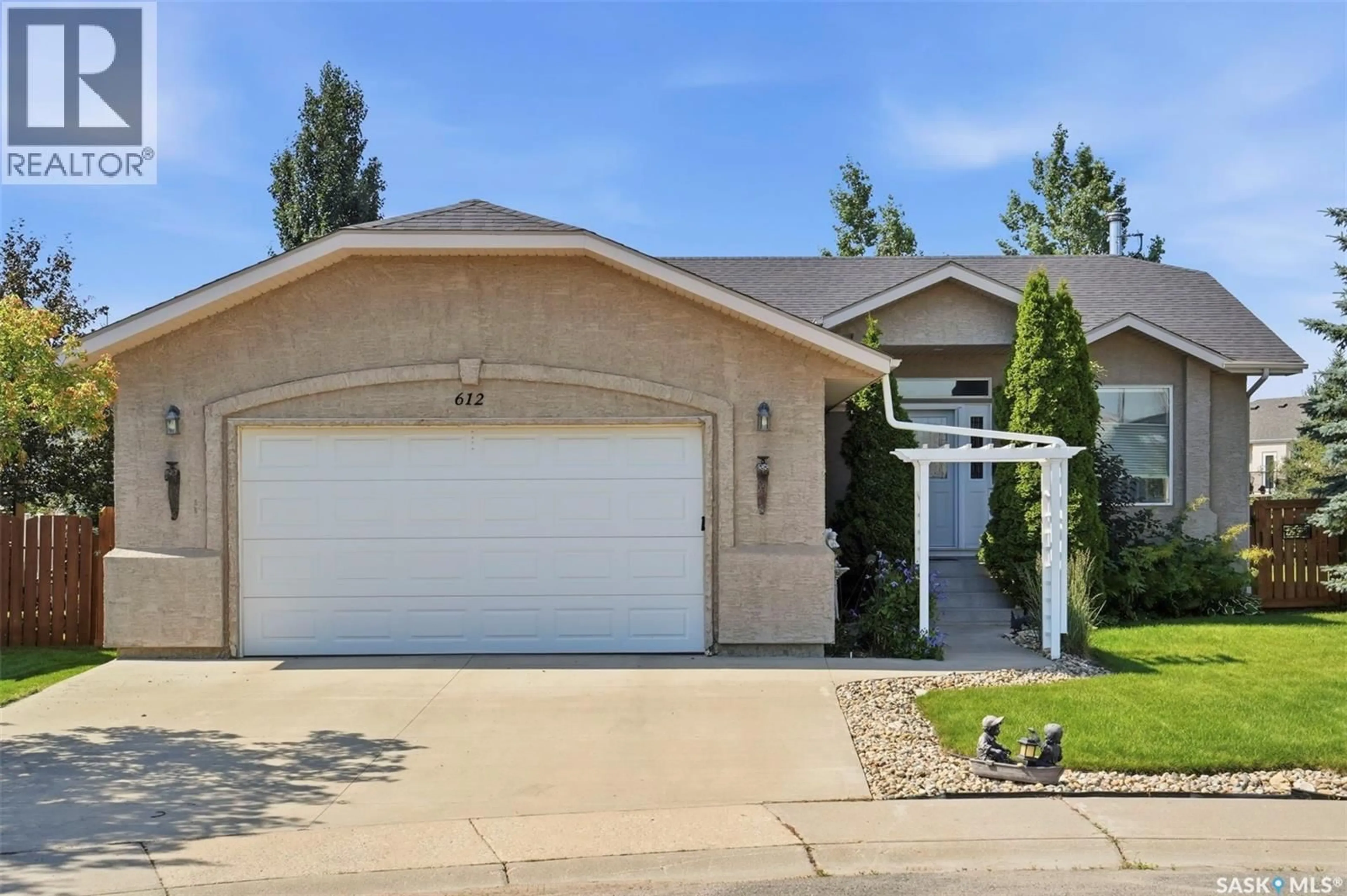 Home with vinyl exterior material, street for 612 GIESBRECHT COURT, Martensville Saskatchewan S0K2T2