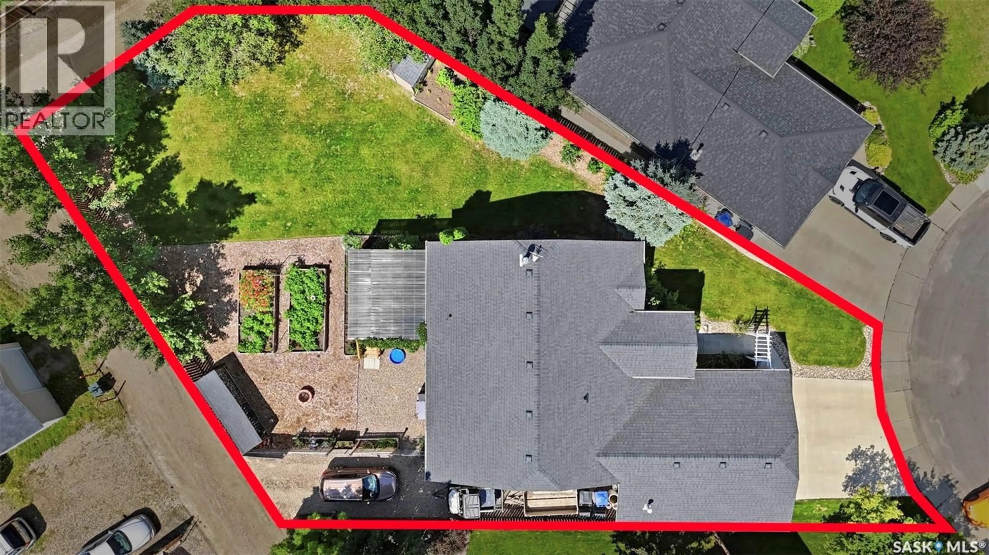 A pic from outside/outdoor area/front of a property/back of a property/a pic from drone, street for 612 GIESBRECHT COURT, Martensville Saskatchewan S0K2T2