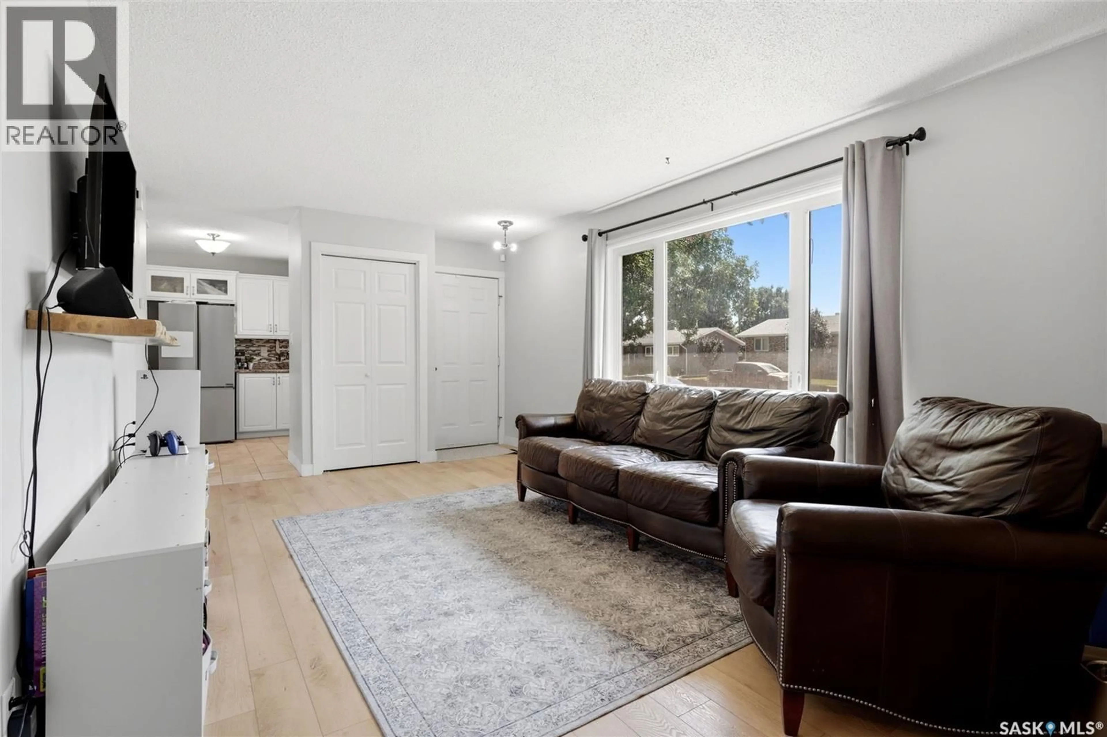 Living room with furniture, unknown for 614 3RD AVENUE, Pilot Butte Saskatchewan S0G3Z0