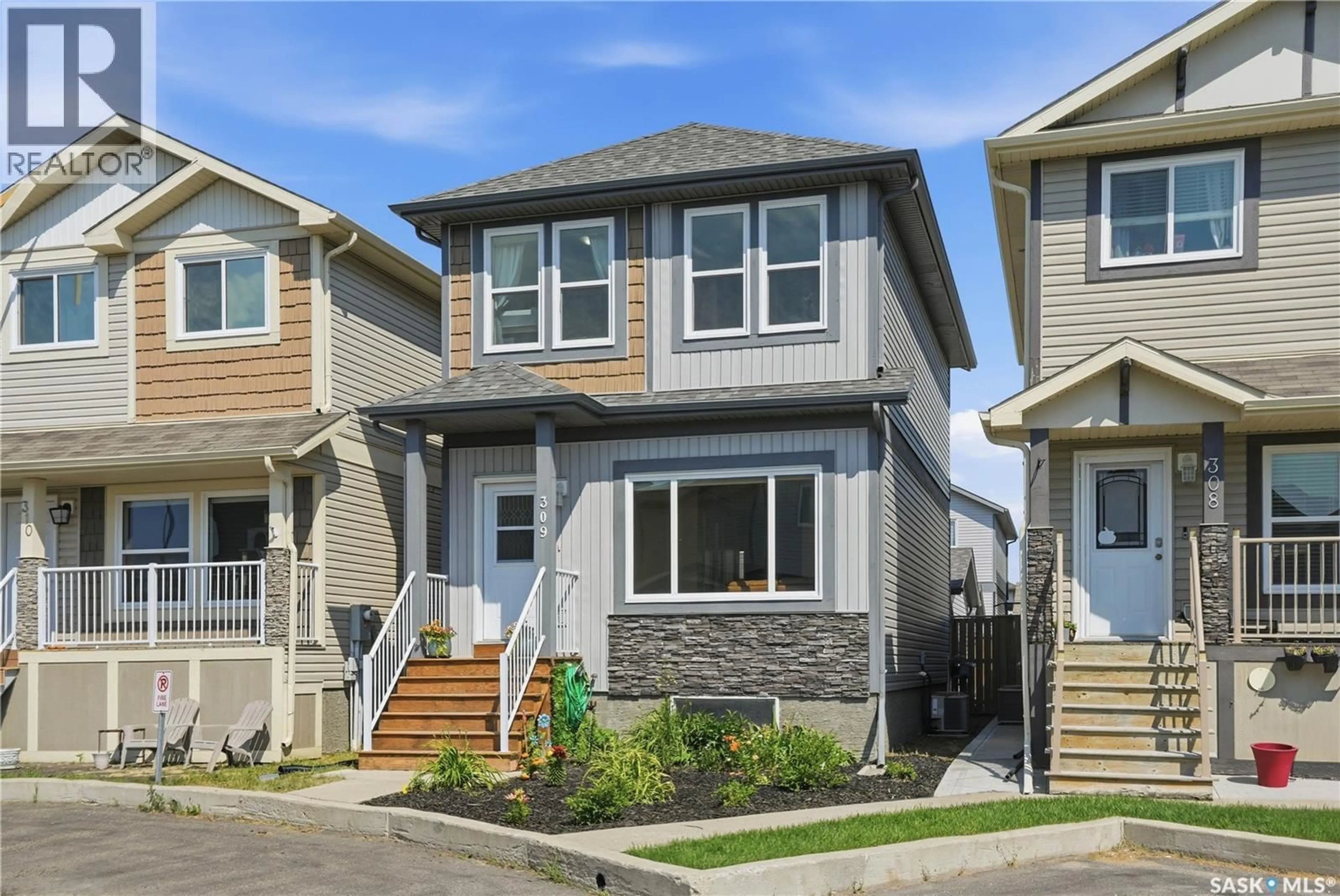 Home with vinyl exterior material, street for 810 - 309 HAMPTON CIRCLE, Saskatoon Saskatchewan S7R0K1