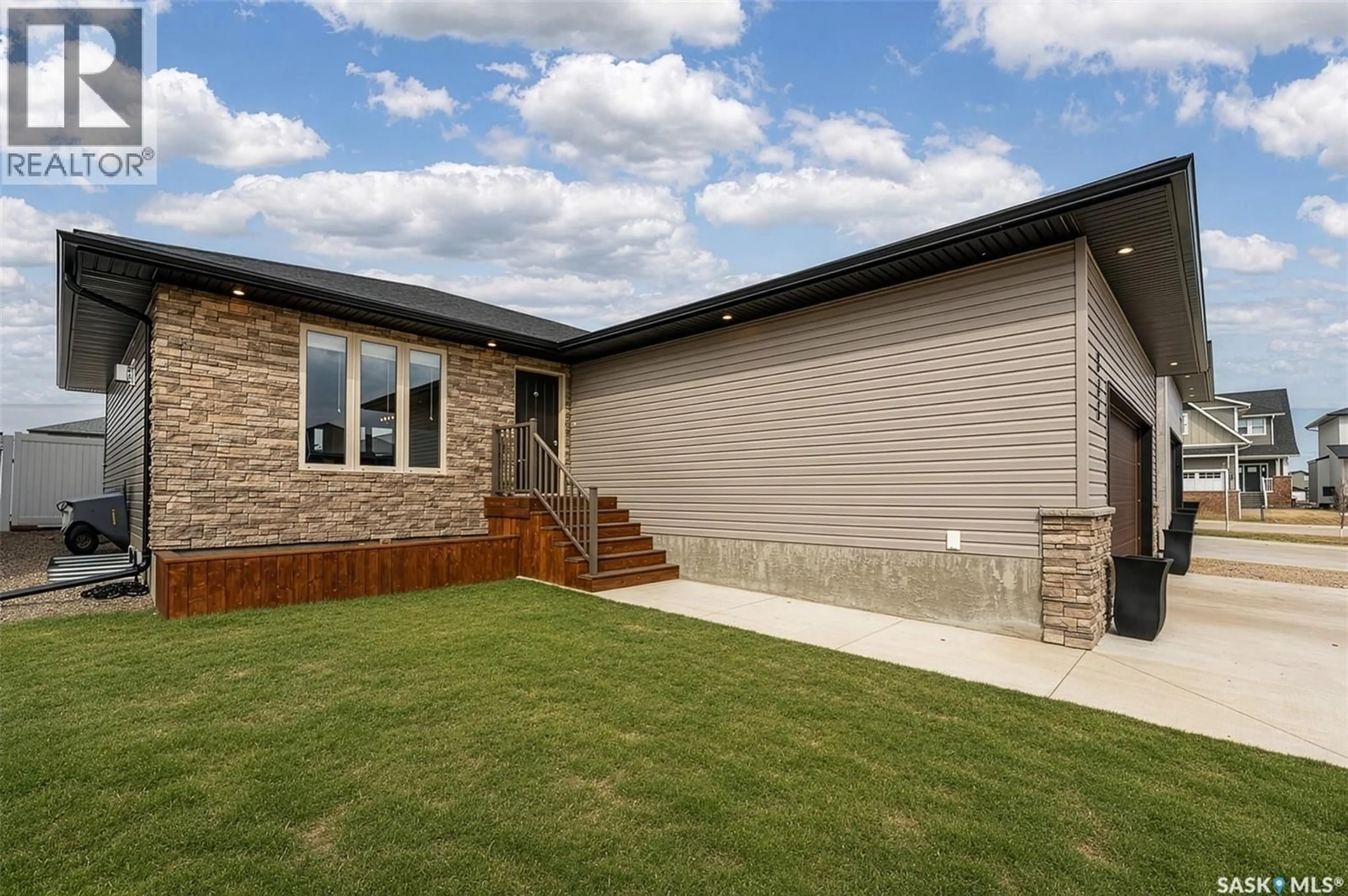 Home with brick exterior material, street for 123 HODGES CRESCENT, Moose Jaw Saskatchewan S6J0B1