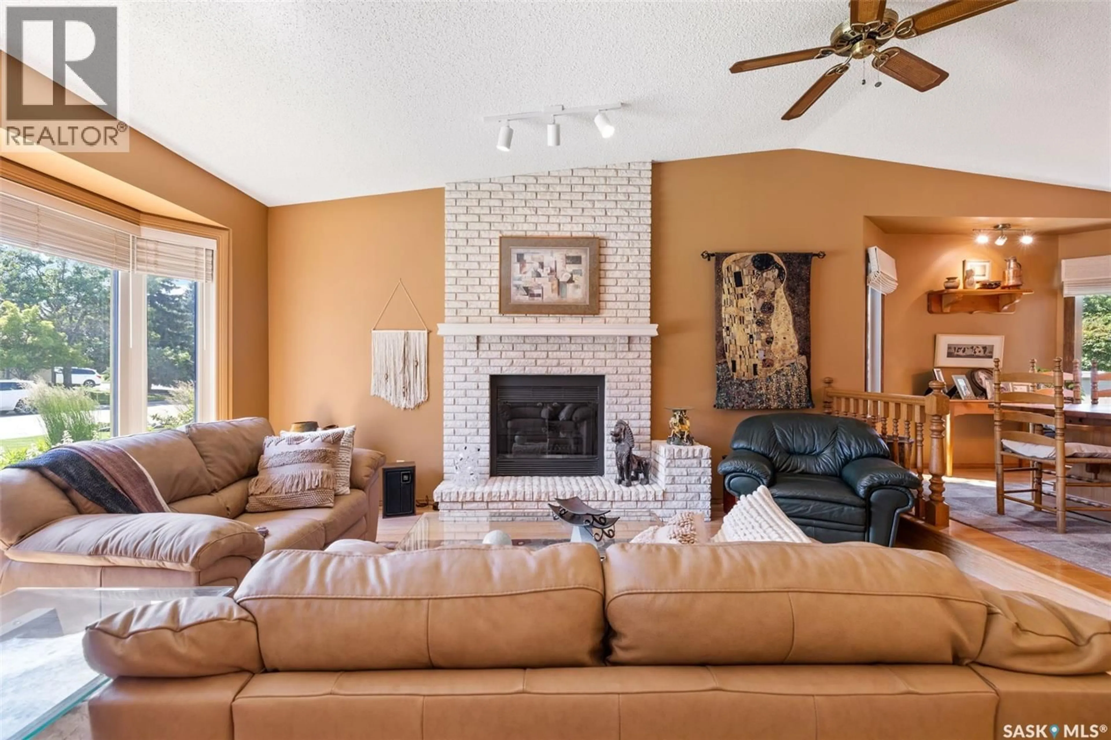 Living room with furniture, ceramic/tile floor for 3147 HARDING STREET, Regina Saskatchewan S4V1Z1