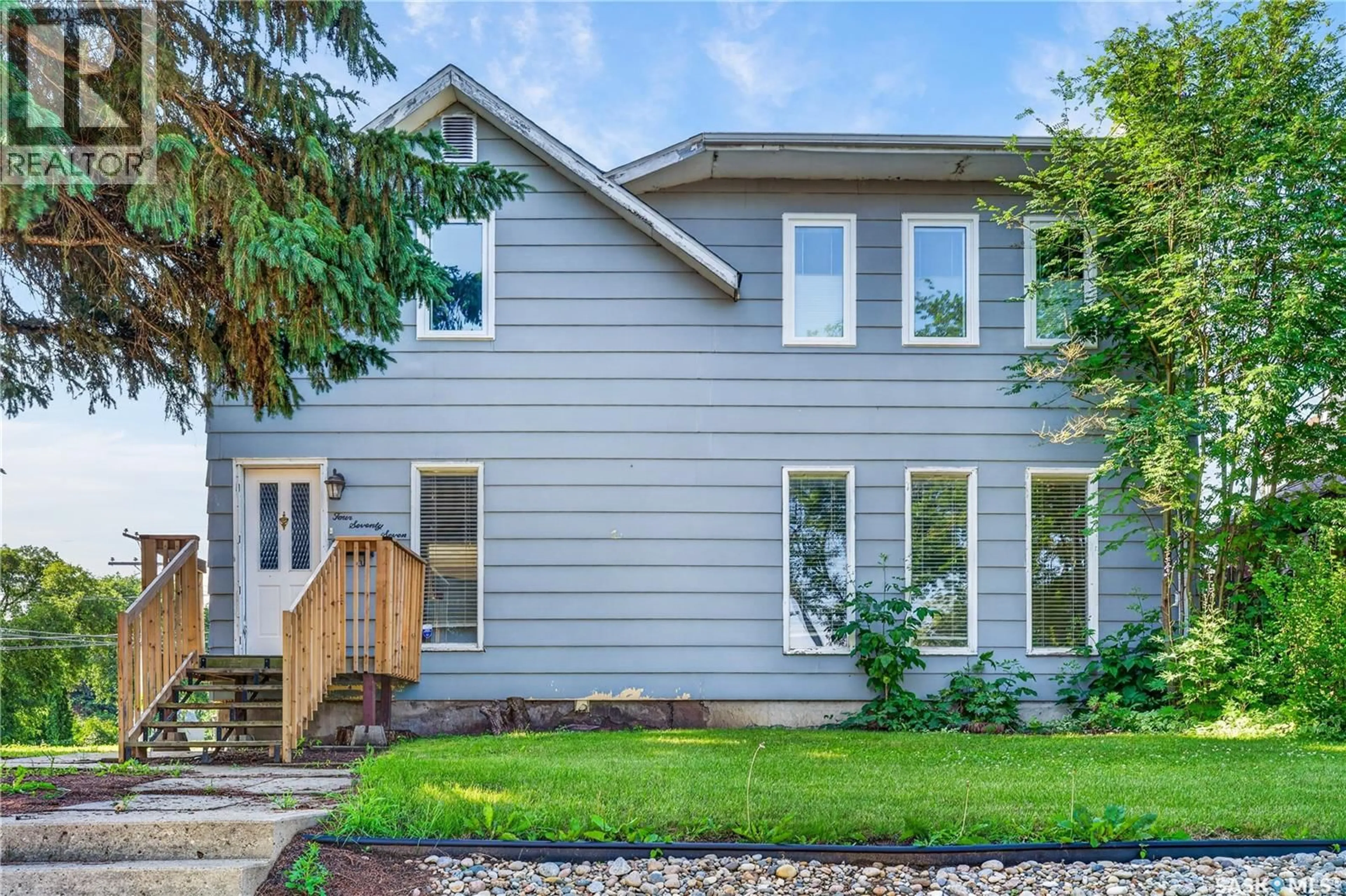Home with vinyl exterior material, street for 477 22ND STREET, Prince Albert Saskatchewan S6V1N5