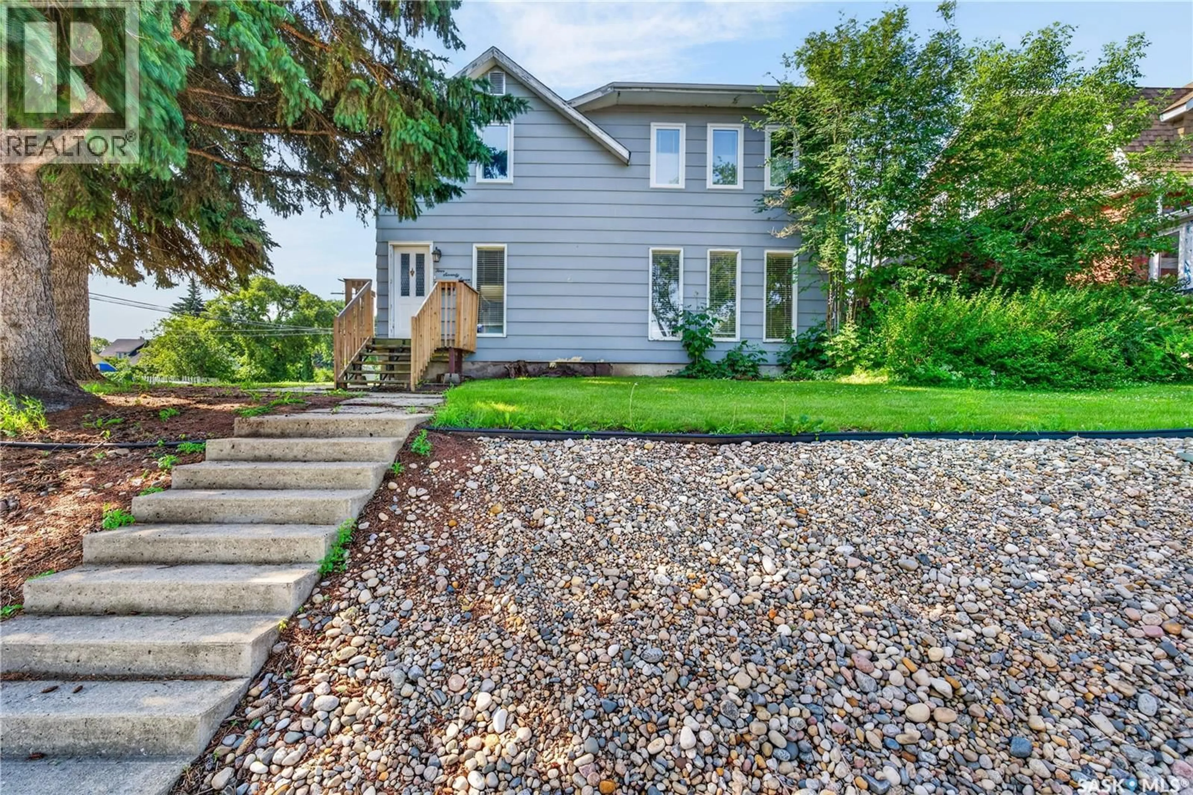 Home with vinyl exterior material, street for 477 22ND STREET, Prince Albert Saskatchewan S6V1N5