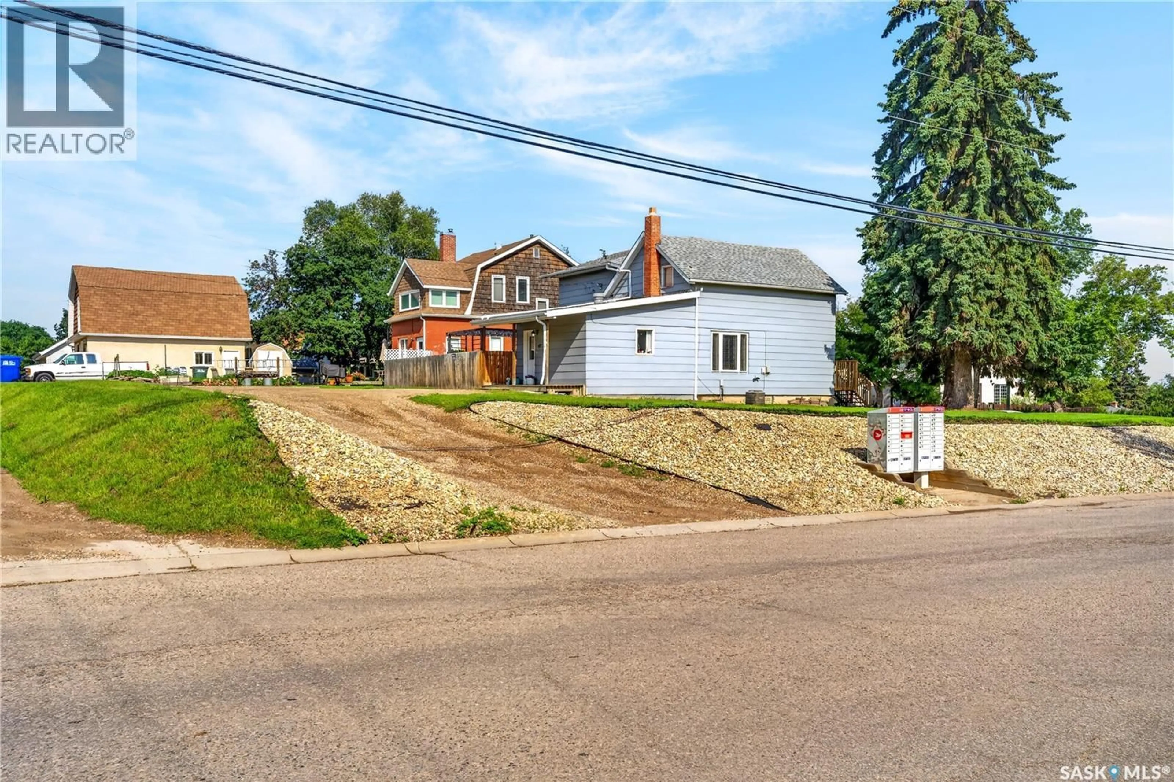 A pic from outside/outdoor area/front of a property/back of a property/a pic from drone, street for 477 22ND STREET, Prince Albert Saskatchewan S6V1N5