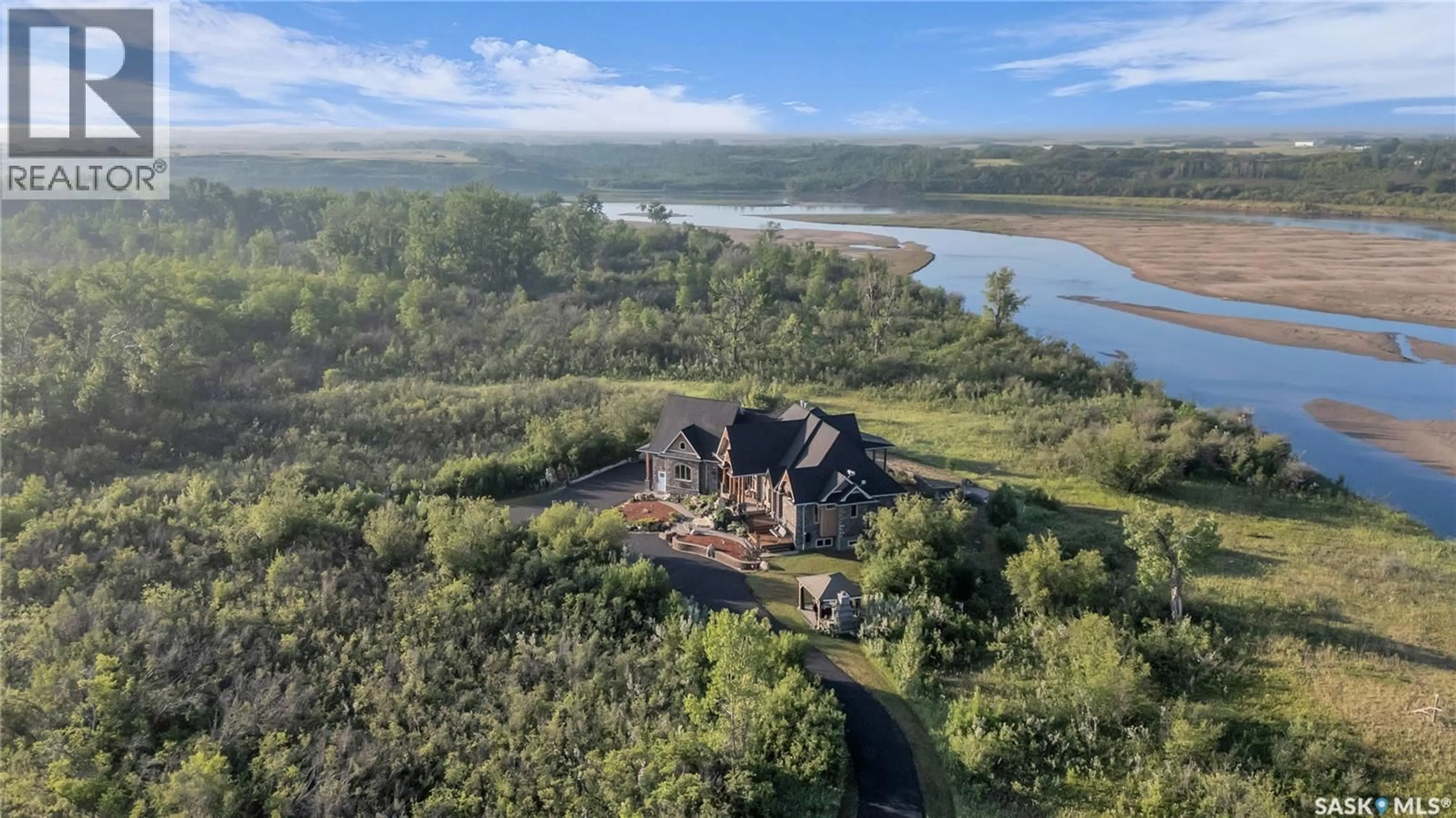A pic from outside/outdoor area/front of a property/back of a property/a pic from drone, water/lake/river/ocean view for DURRETTE RIVERFRONT ACREAGE, South Saskatchewan River Saskatchewan S7K3J6