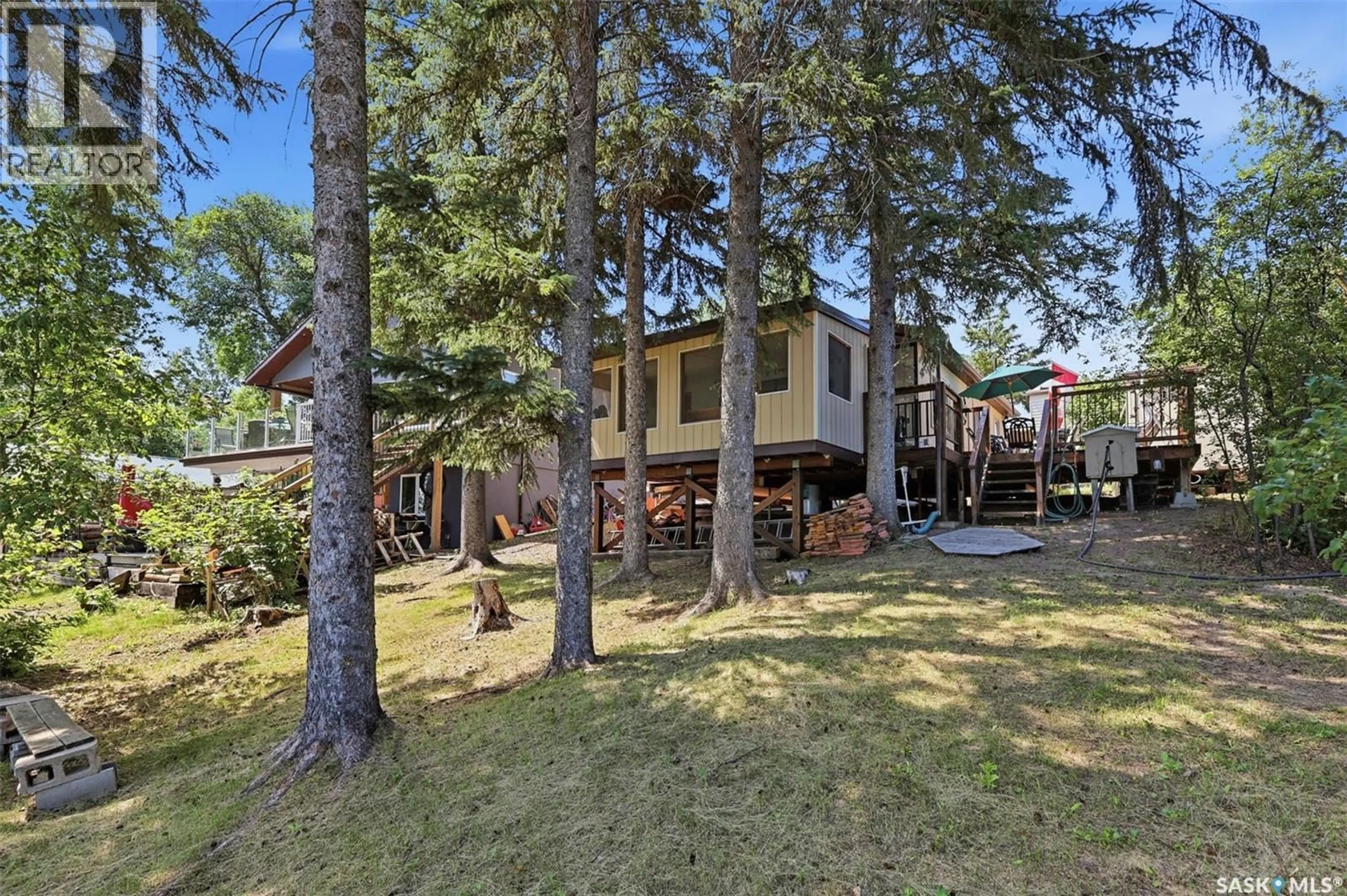 A pic from outside/outdoor area/front of a property/back of a property/a pic from drone, unknown for 60 NAVY AVENUE, Pike Lake Provincial Park Saskatchewan S7K1N2