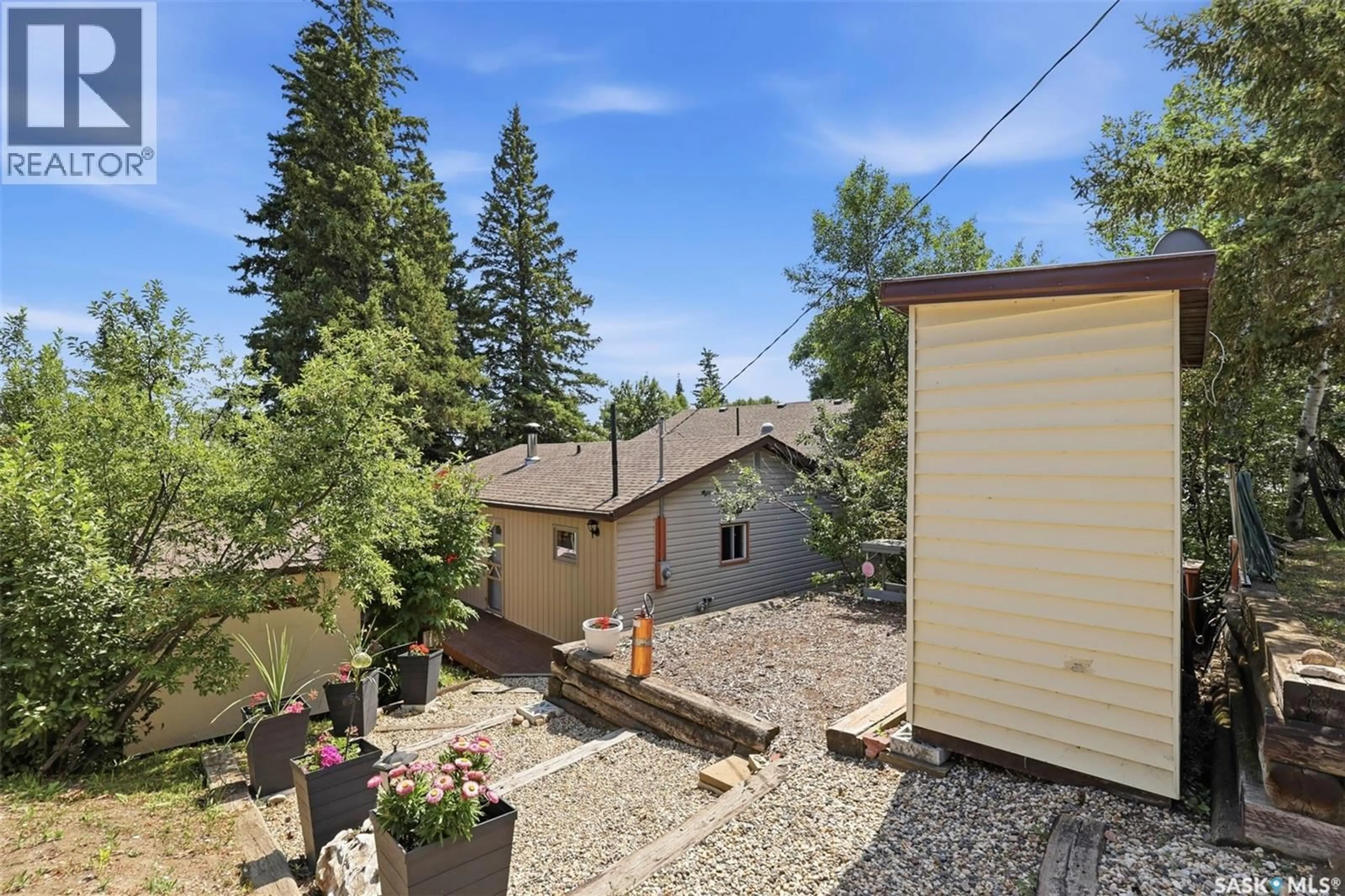 A pic from outside/outdoor area/front of a property/back of a property/a pic from drone, unknown for 60 NAVY AVENUE, Pike Lake Provincial Park Saskatchewan S7K1N2