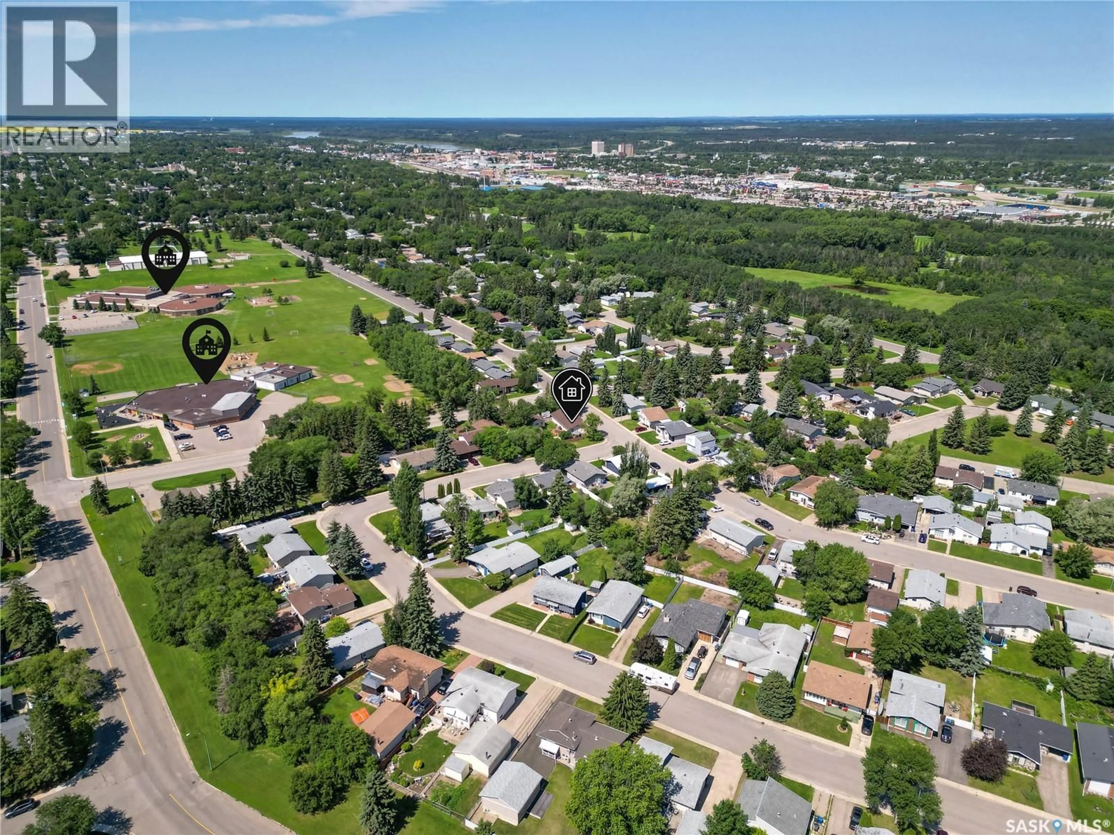 A pic from outside/outdoor area/front of a property/back of a property/a pic from drone, street for 1201 MCKAY DRIVE, Prince Albert Saskatchewan S6V5V1