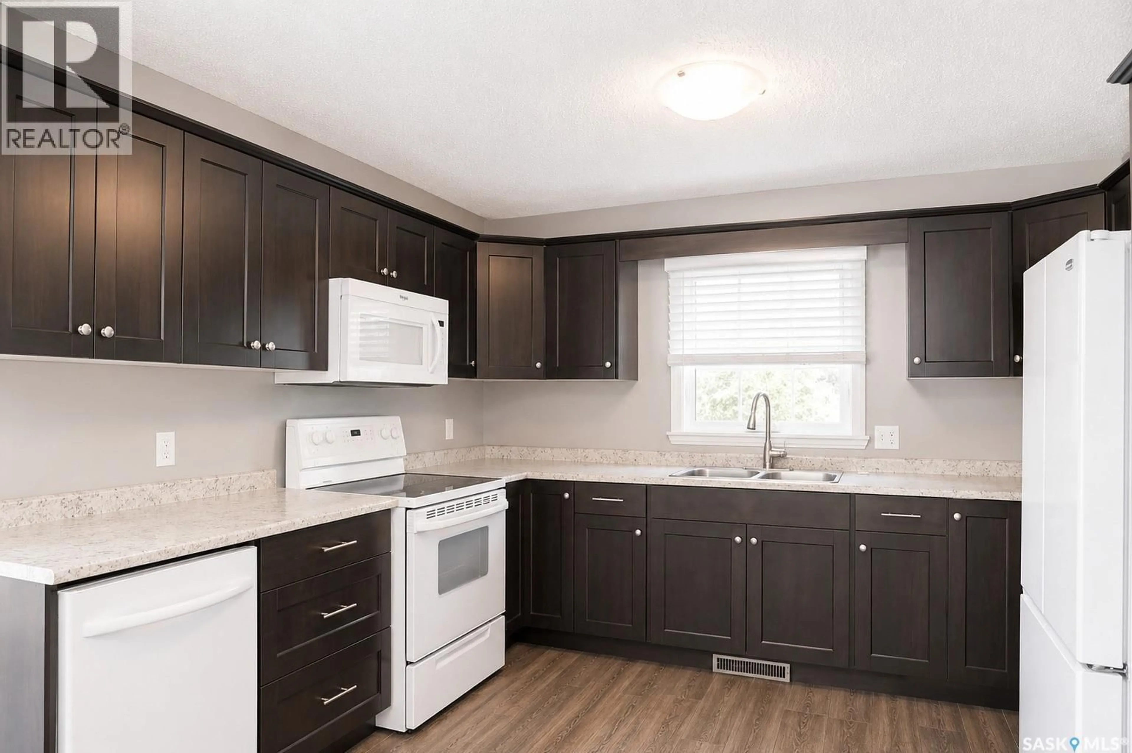 Standard kitchen, wood/laminate floor for 326 3RD AVENUE, Young Saskatchewan S0K4Y0