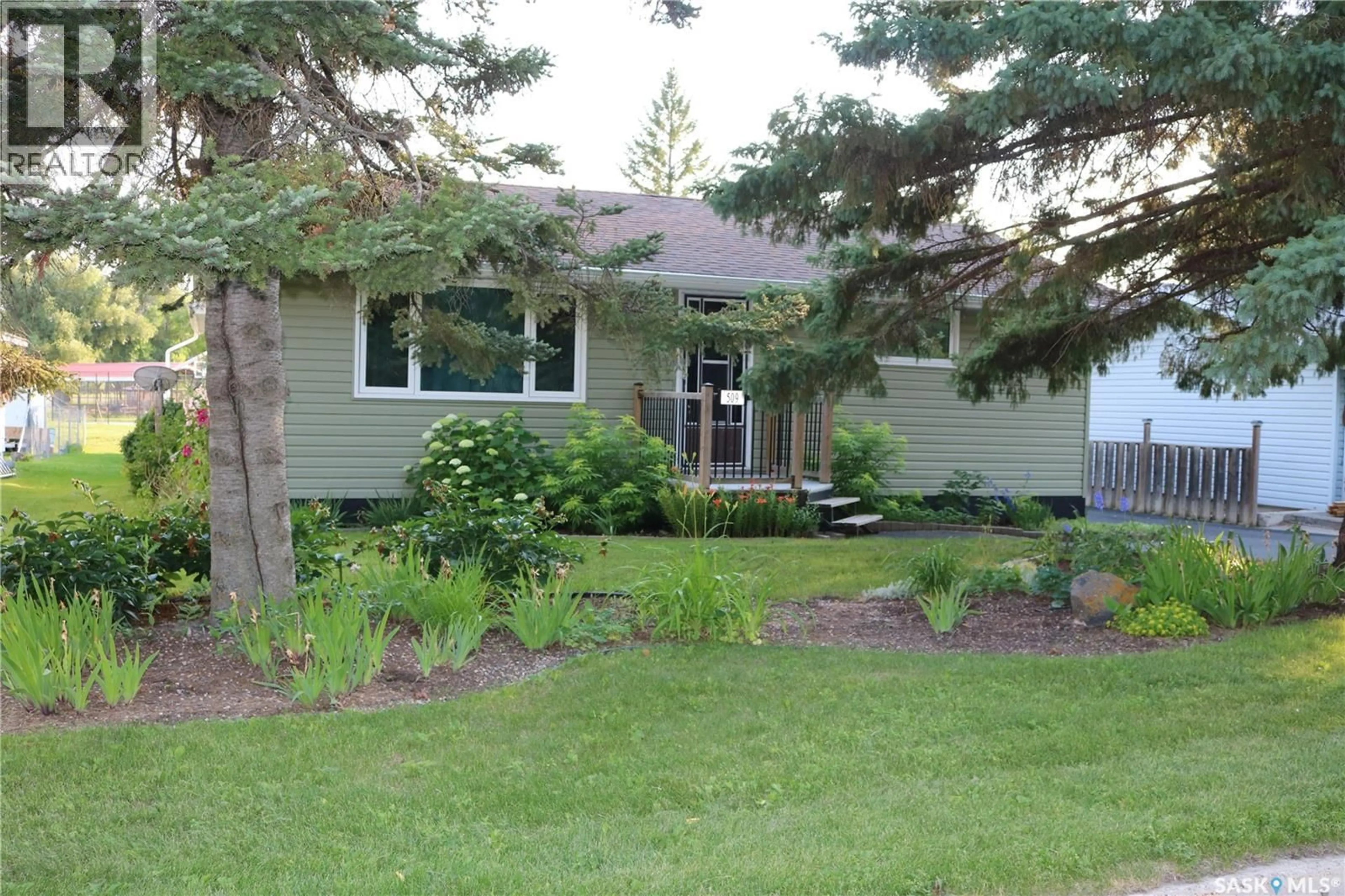 Home with vinyl exterior material, street for 509 MARK AVENUE, Moosomin Saskatchewan S0G3N0