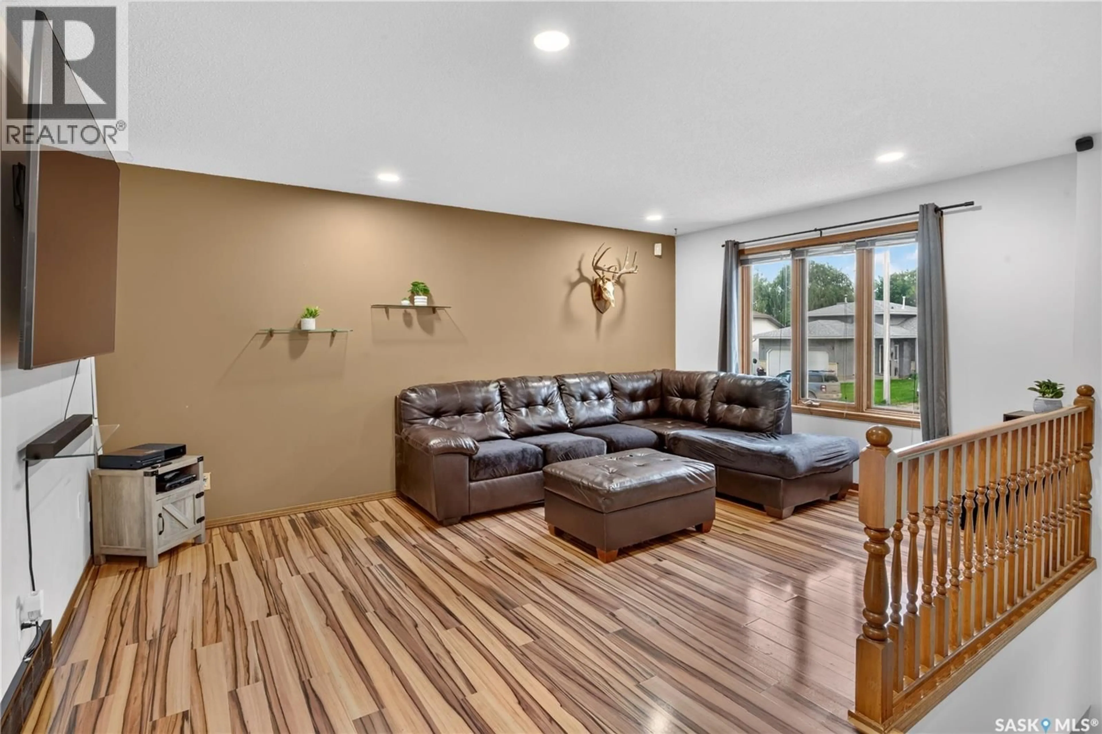 Living room with furniture, unknown for 417 FEHR CRESCENT, Martensville Saskatchewan S0K2T0