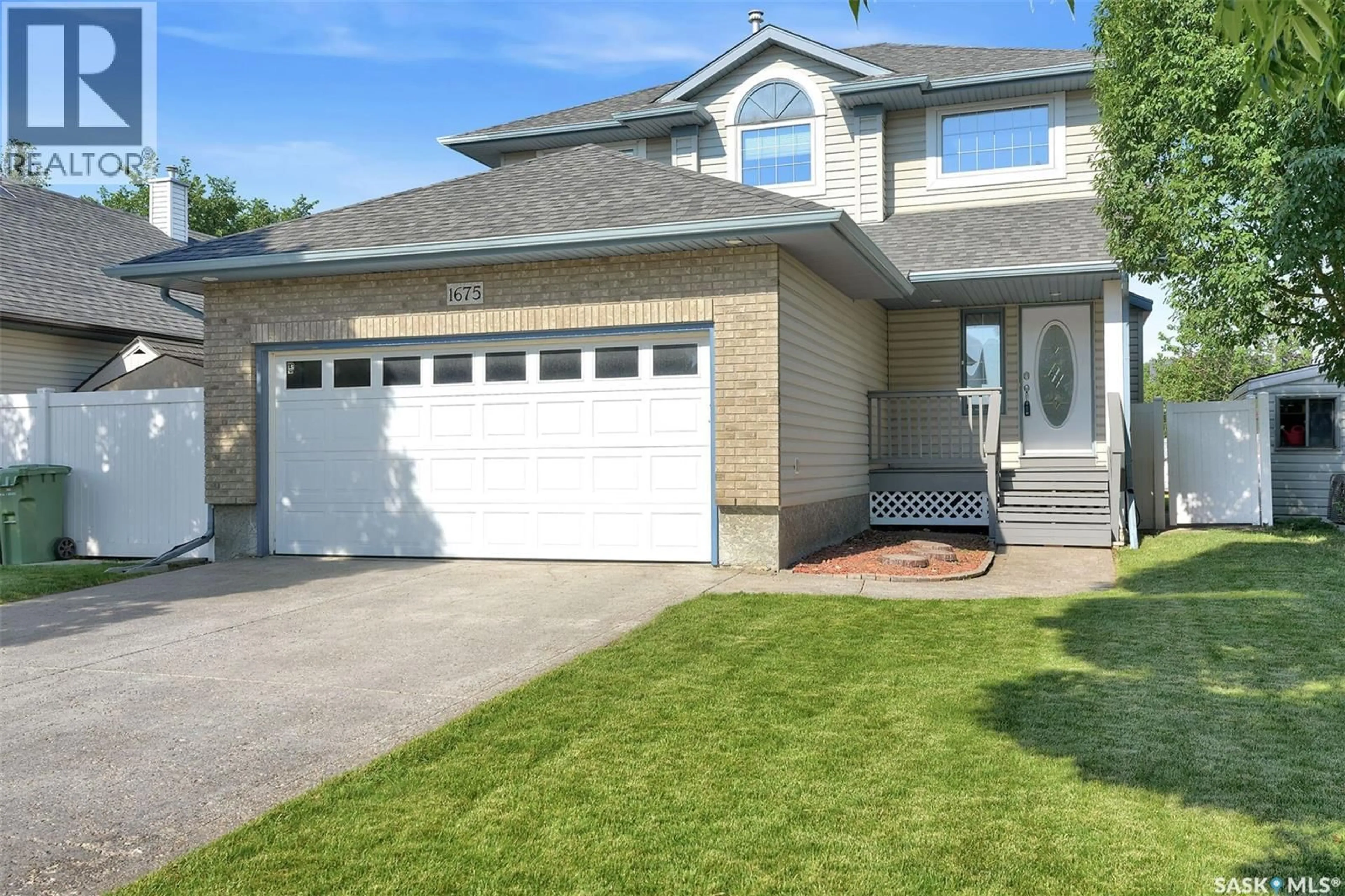 Home with vinyl exterior material, street for 1675 ROUSSEAU CRESCENT, Regina Saskatchewan S4X4L9
