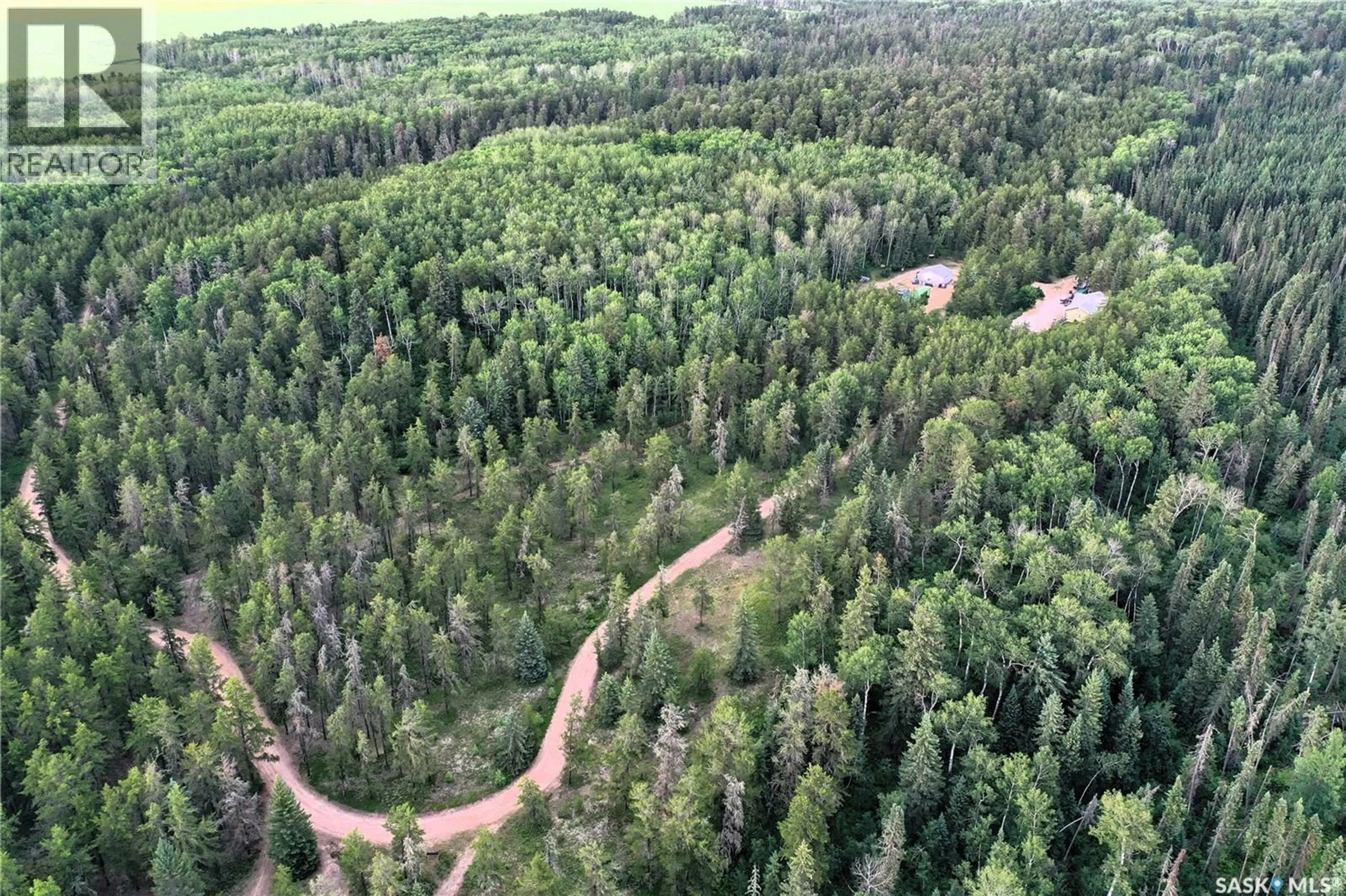A pic from outside/outdoor area/front of a property/back of a property/a pic from drone, forest/trees view for MACLEOD ACRES, Torch River Rm No. 488 Saskatchewan S0E1E0