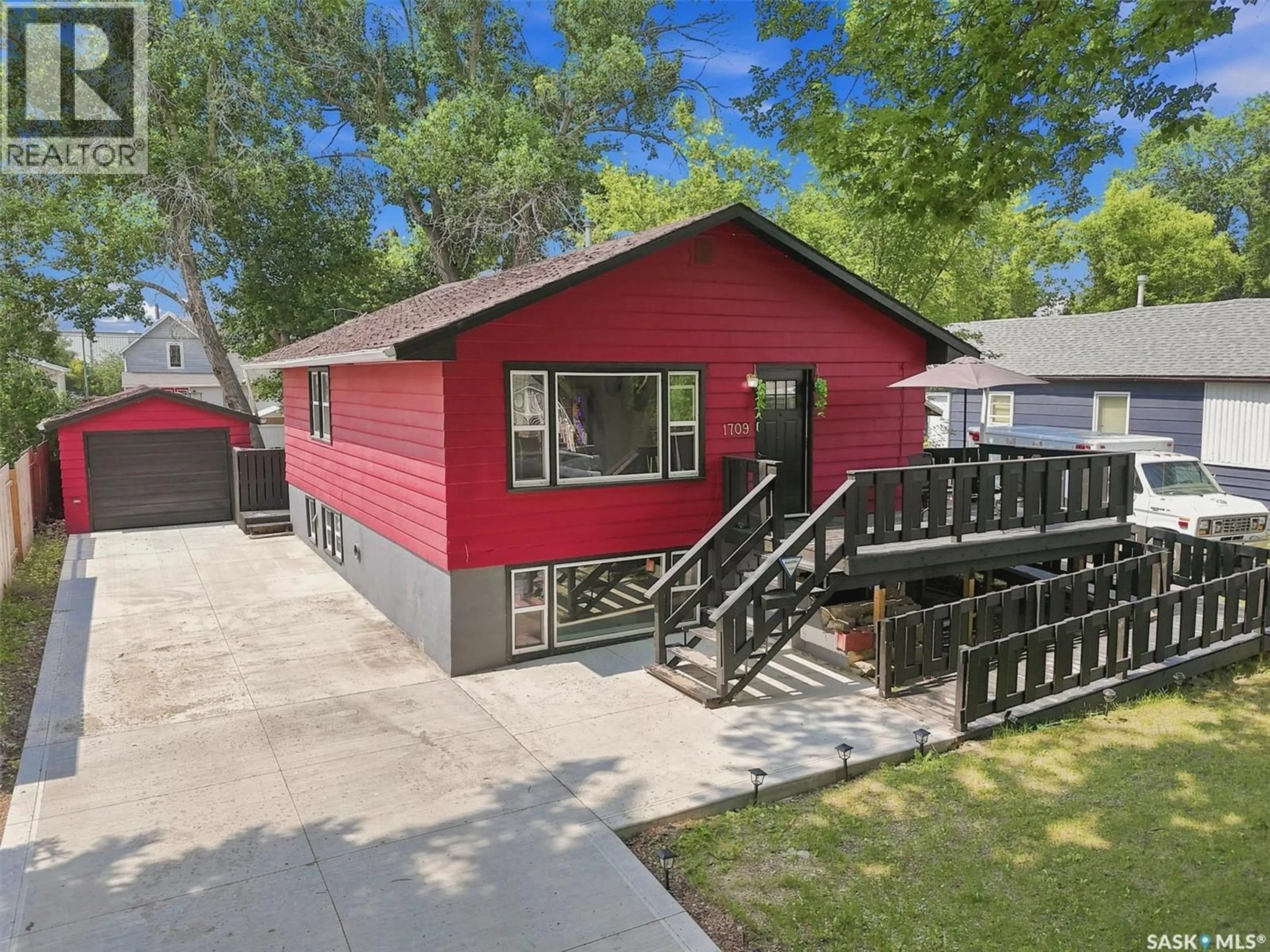 Home with vinyl exterior material, street for 1709 2ND AVENUE, Saskatoon Saskatchewan S7K3N2
